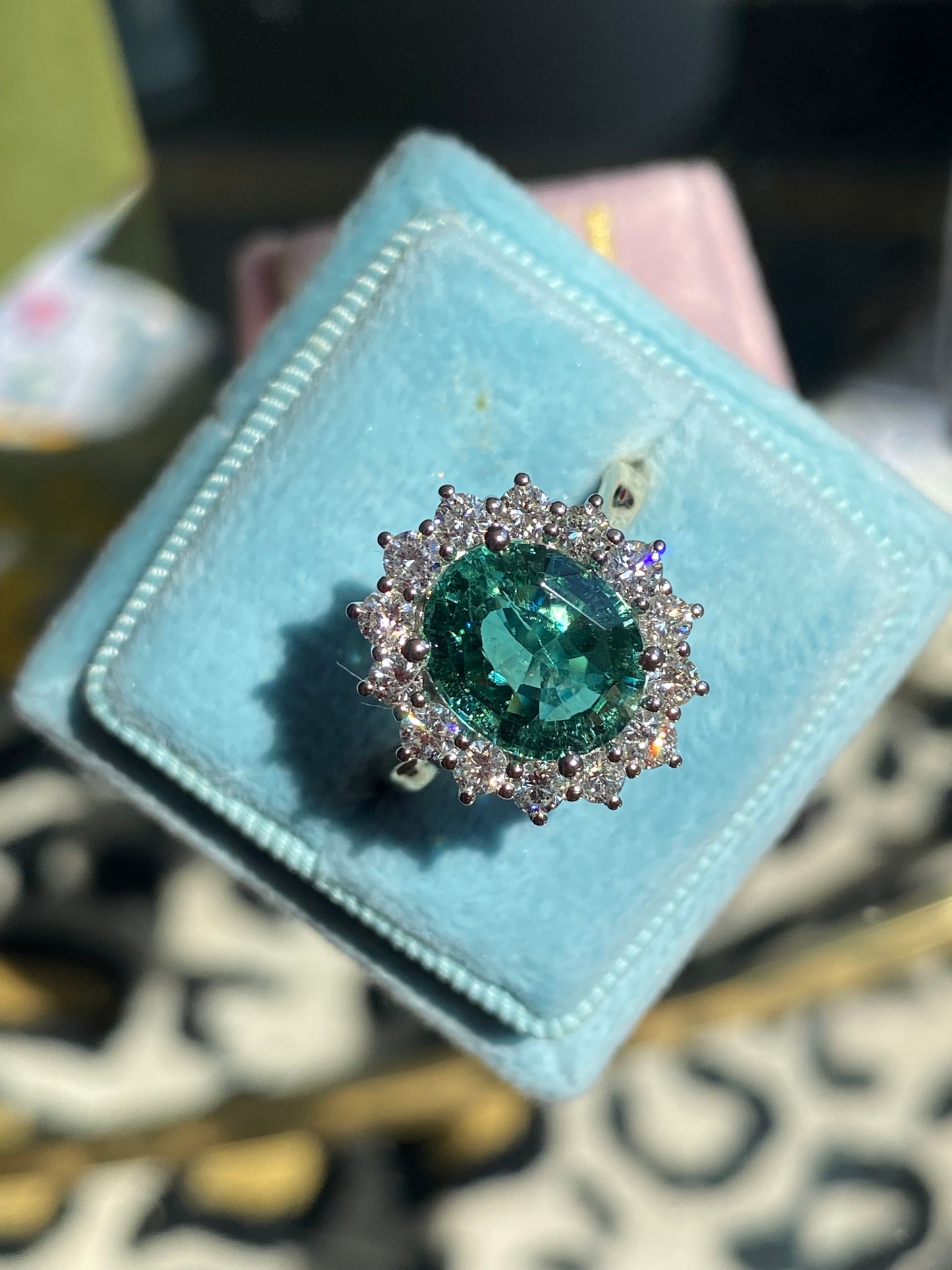 3.06 Carat Blue Tourmaline and Natural Diamond Halo Ring in Platinum and 18ct Yellow Gold
