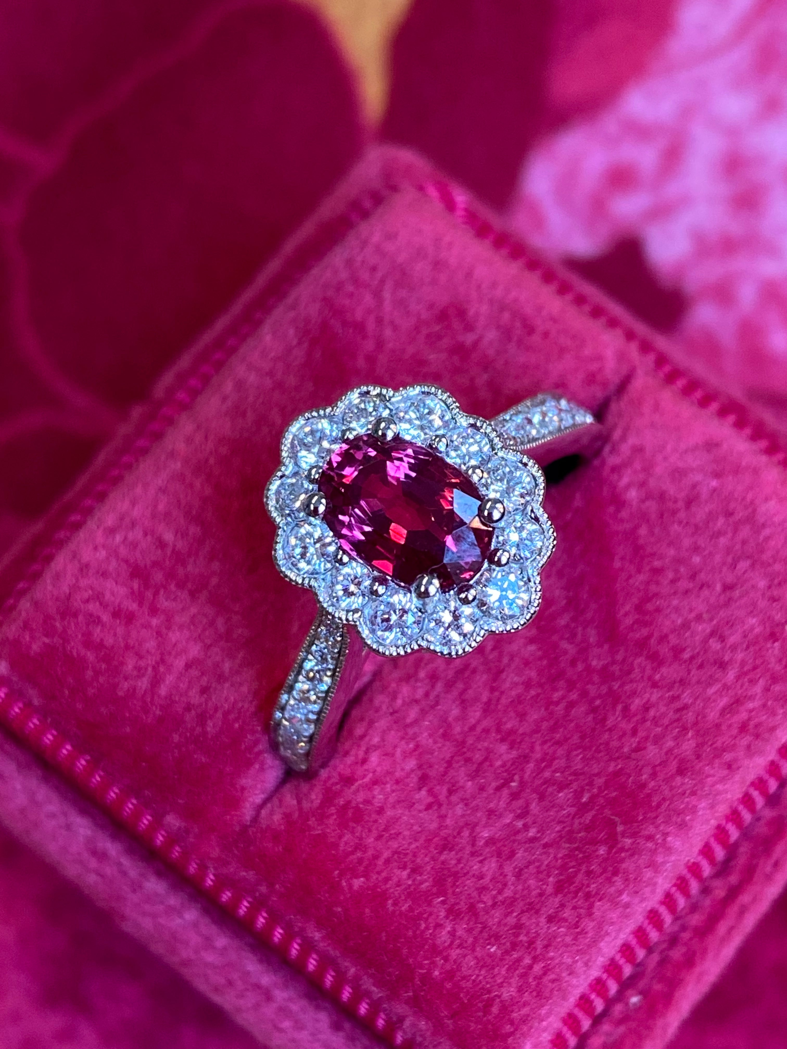 Oval-Cut Ruby and Natural Diamond Halo Ring in Platinum
