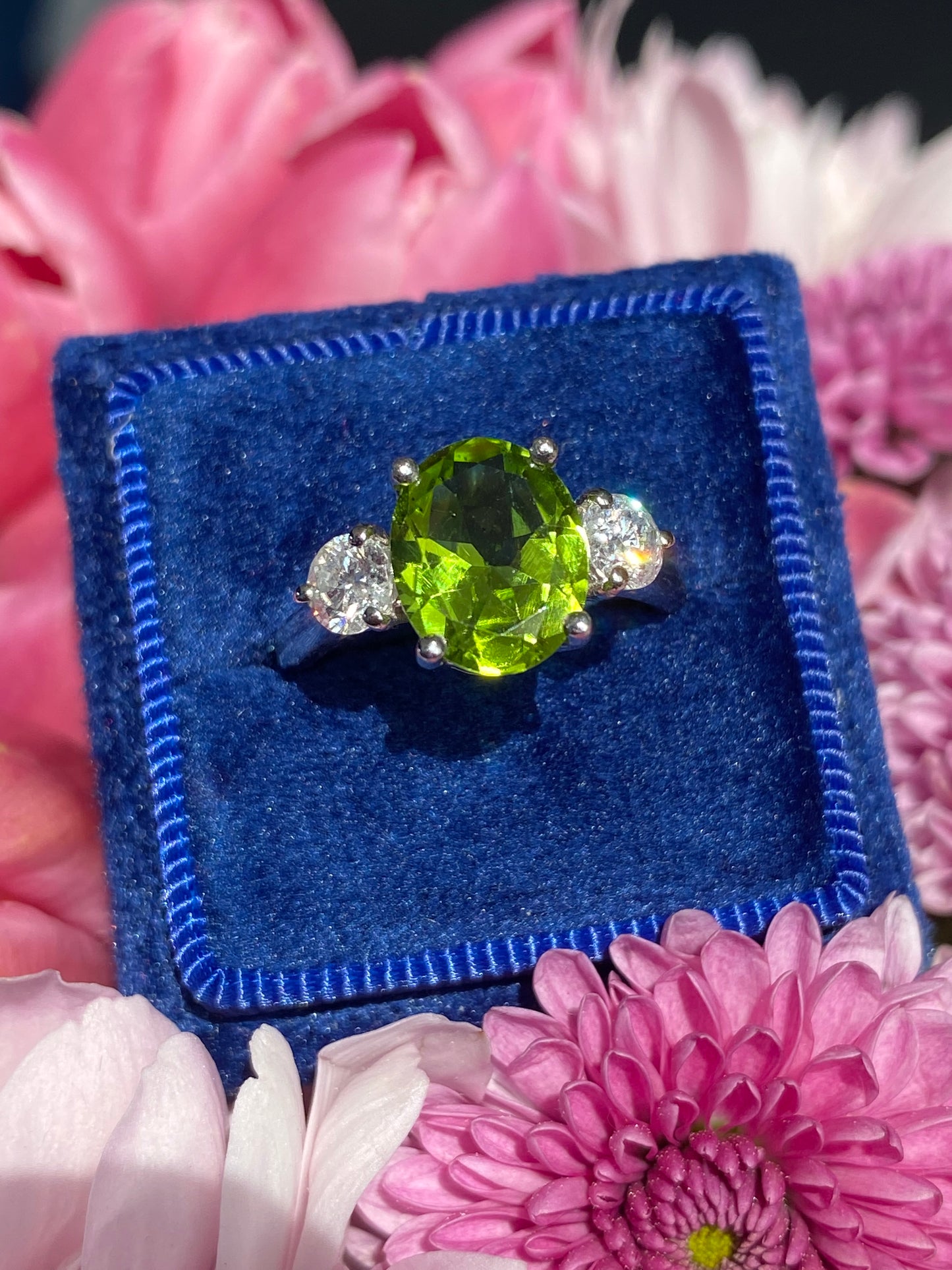 2.61 Carat Peridot and Natural Diamond Three Stone Ring