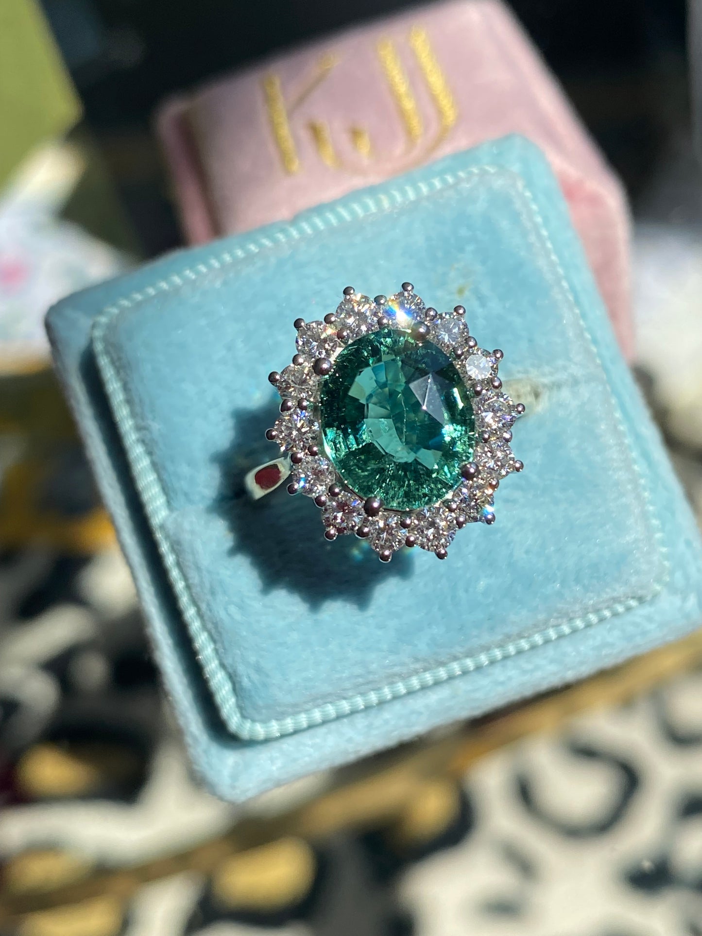 3.06 Carat Blue Tourmaline and Natural Diamond Halo Ring in Platinum and 18ct Yellow Gold
