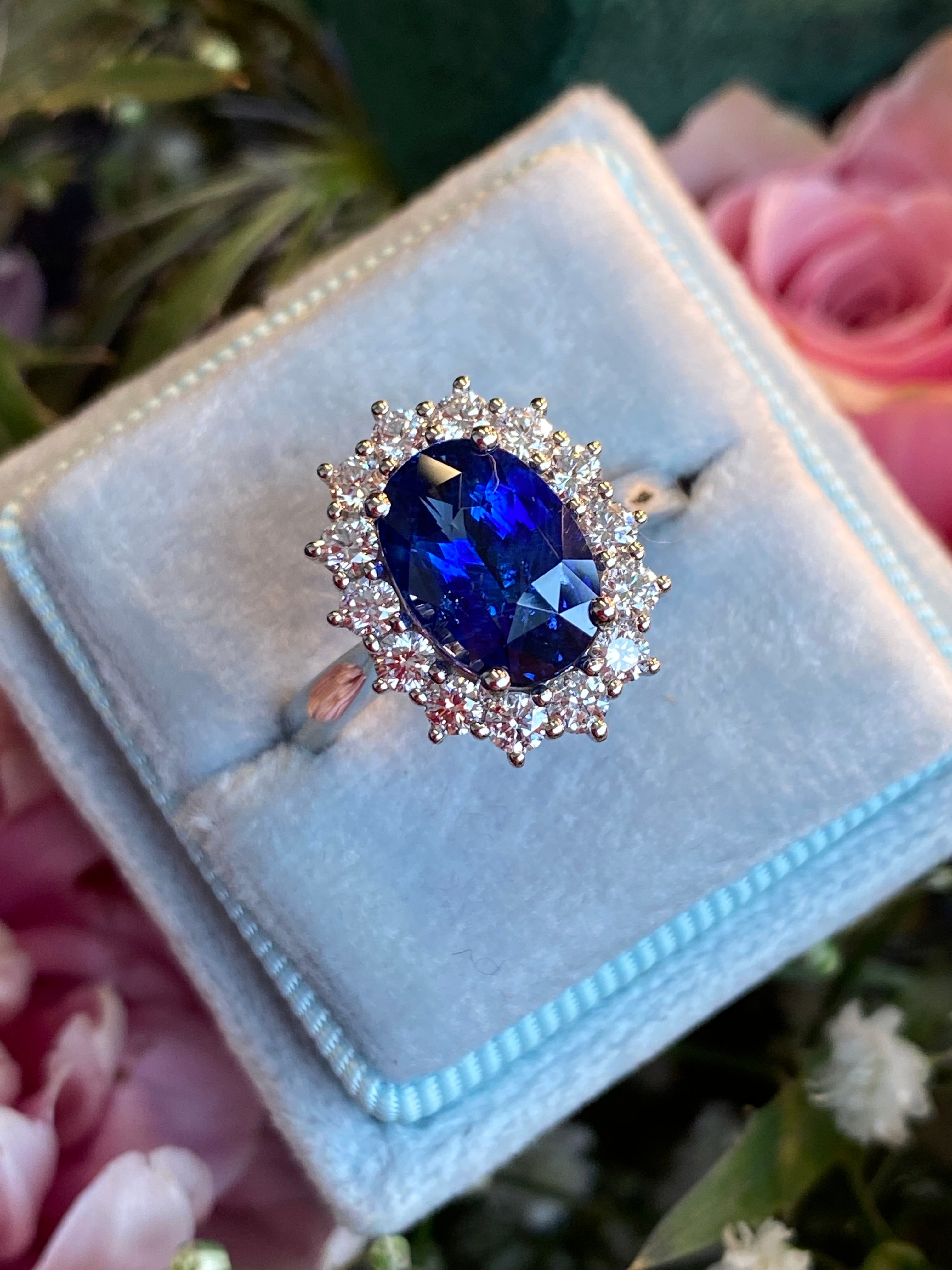 3.04 Carat Blue Ceylon Sapphire and 0.63 CTW Natural Diamond Halo Ring in Platinum