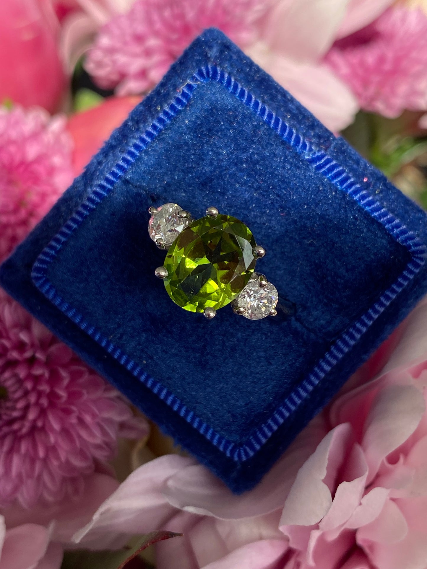 2.61 Carat Peridot and Natural Diamond Three Stone Ring
