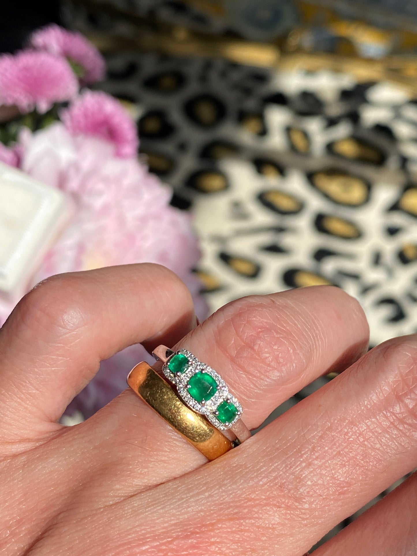 0.65ctw Emerald and Diamond Three Stone Halo Ring in Platinum