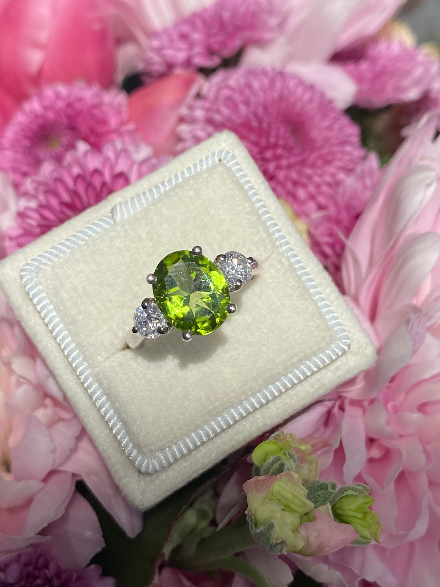 2.61 Carat Peridot and Natural Diamond Three Stone Ring