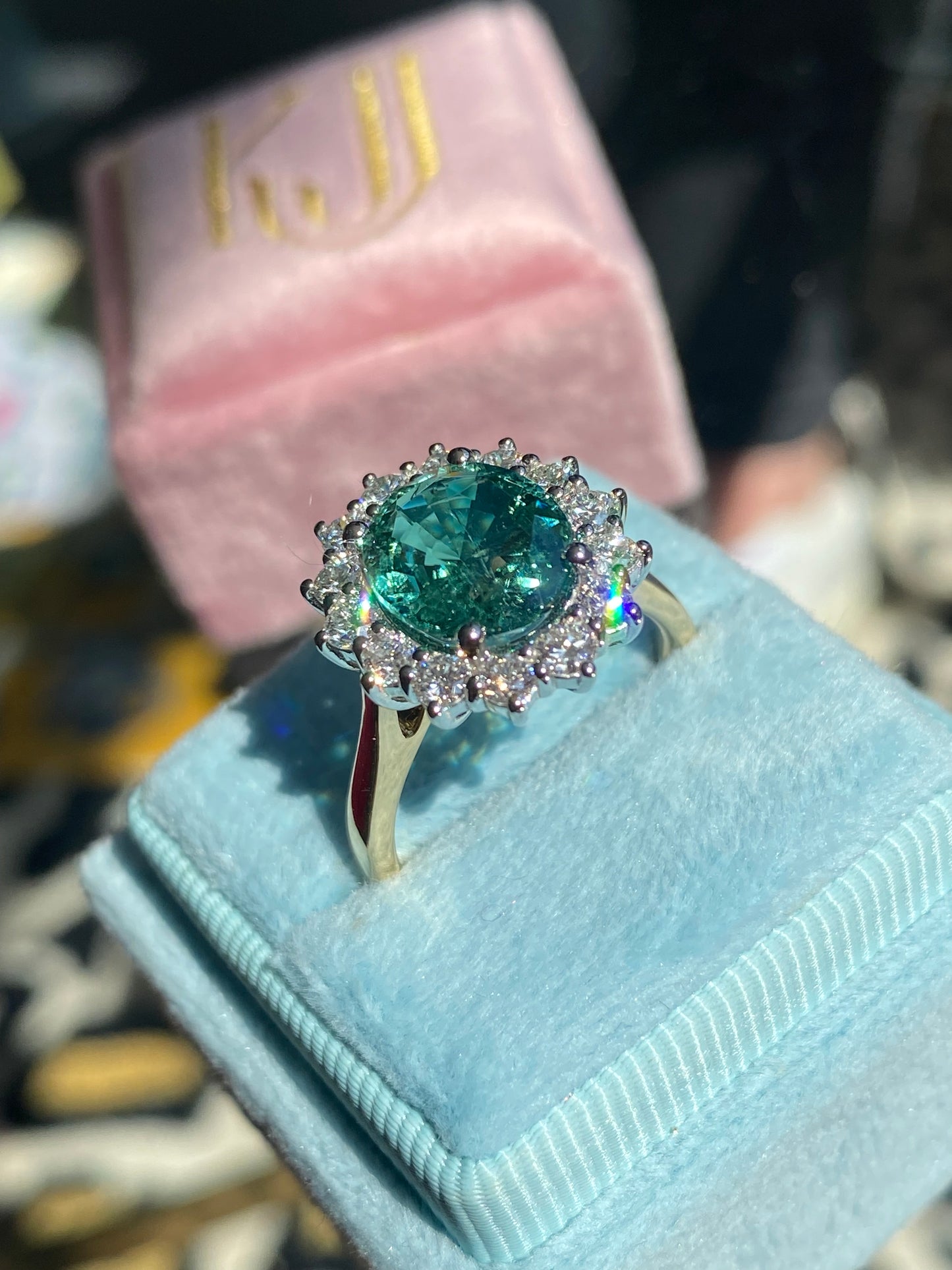 3.06 Carat Blue Tourmaline and Natural Diamond Halo Ring in Platinum and 18ct Yellow Gold