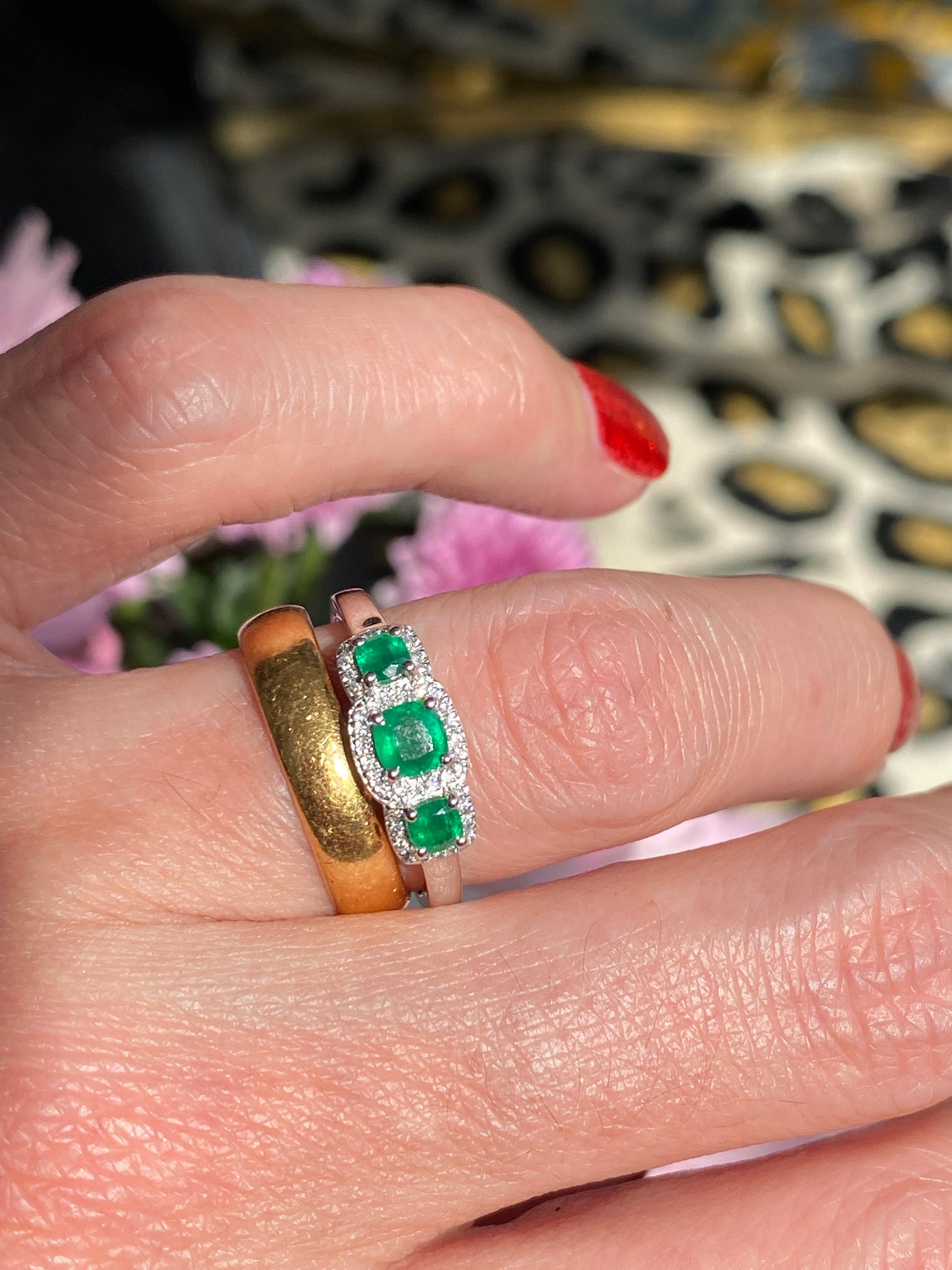0.65ctw Emerald and Diamond Three Stone Halo Ring in Platinum
