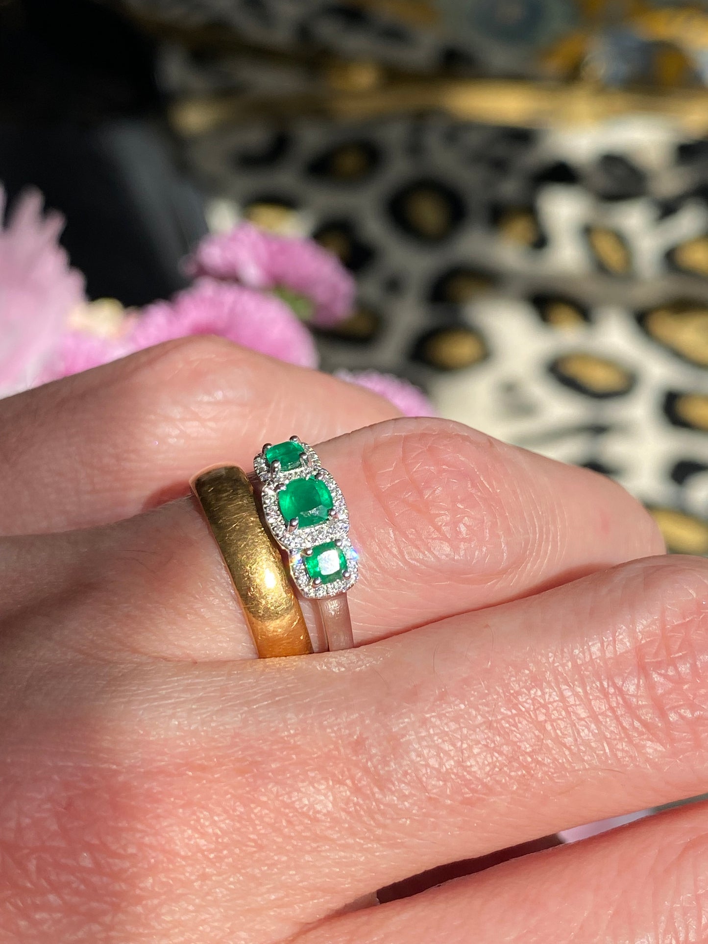 0.65ctw Emerald and Diamond Three Stone Halo Ring in Platinum