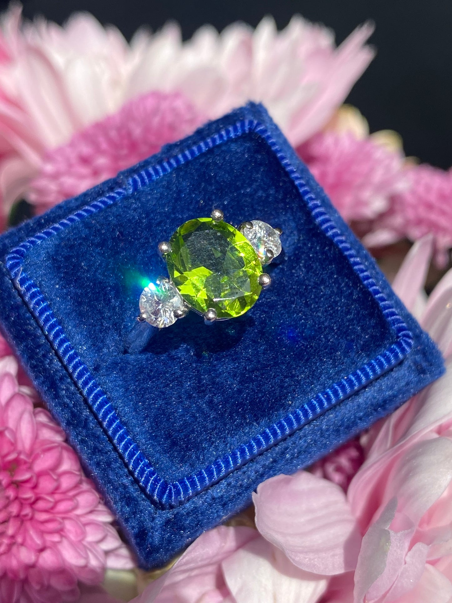 2.61 Carat Peridot and Natural Diamond Three Stone Ring