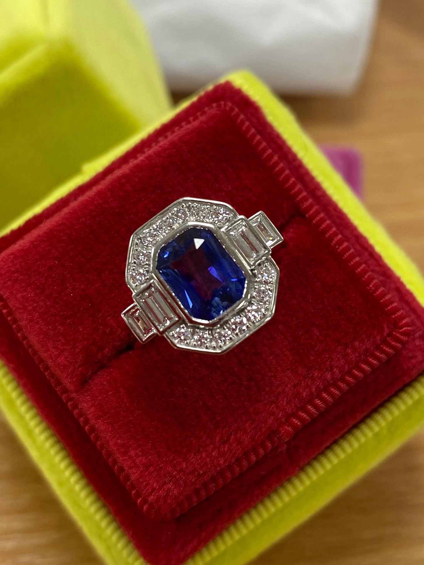 2.06 Carat Emerald Cut Sapphire and Natural Diamond Halo Ring in Platinum and 18ct Yellow Gold