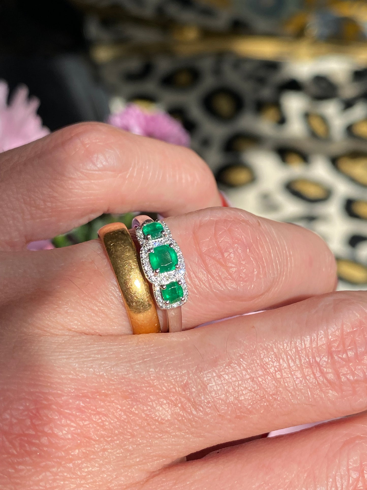 0.65ctw Emerald and Diamond Three Stone Halo Ring in Platinum