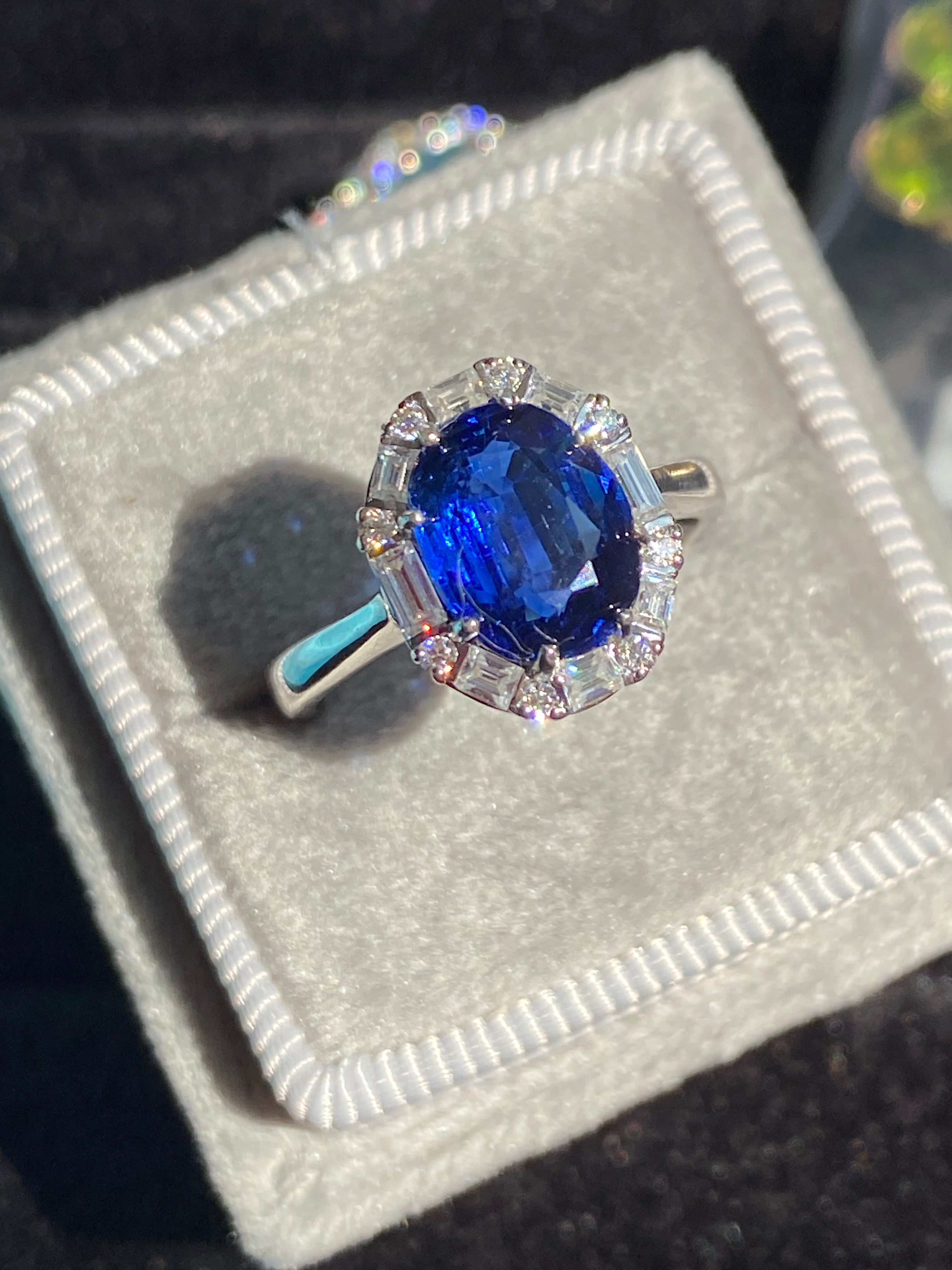 2.90 CTW Oval Cut Kyanite and Moissanite Halo Ring in Sterling Silver