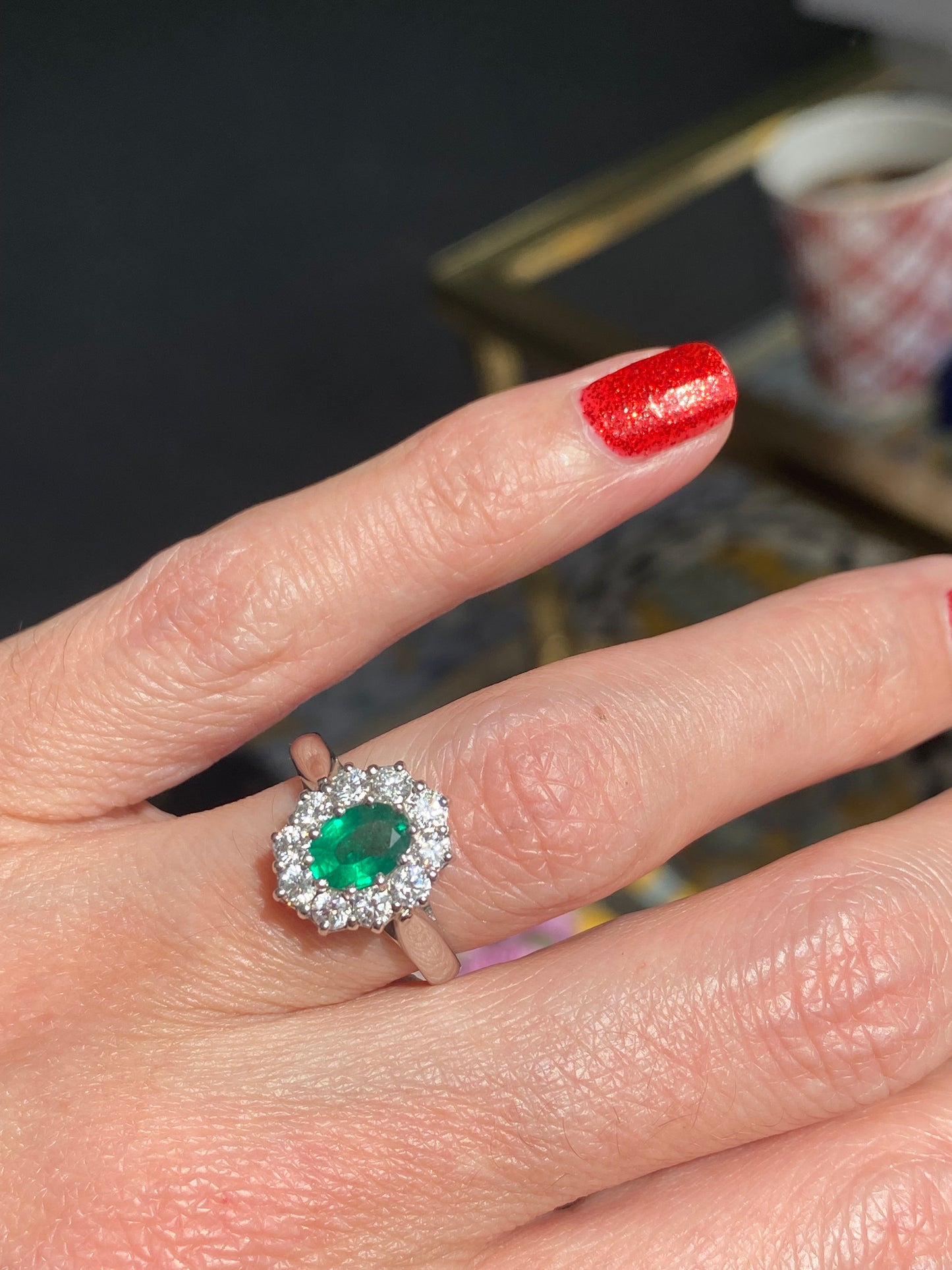 0.60 Carat Emerald and 0.66 ctw Natural Diamond Halo Engagement Ring in Platinum