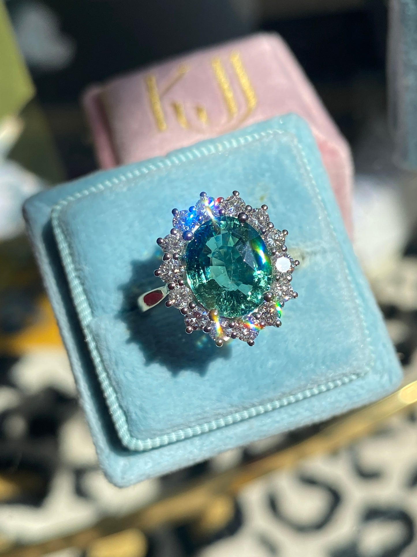 3.06 Carat Blue Tourmaline and Natural Diamond Halo Ring in Platinum and 18ct Yellow Gold