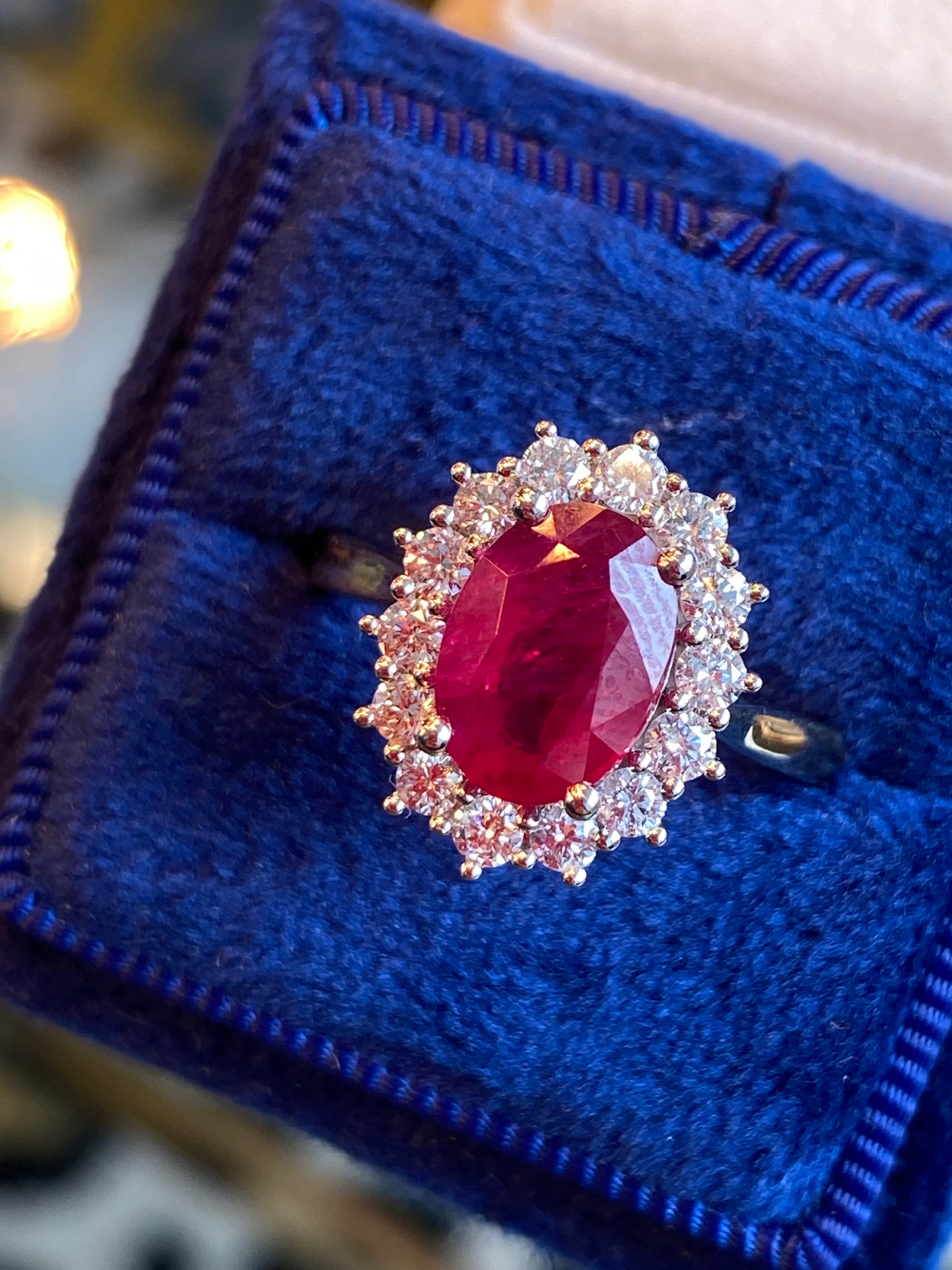 2.95ctw Oval-Cut Ruby and Natural Diamond Halo Ring in Platinum and 18ct Yellow Gold