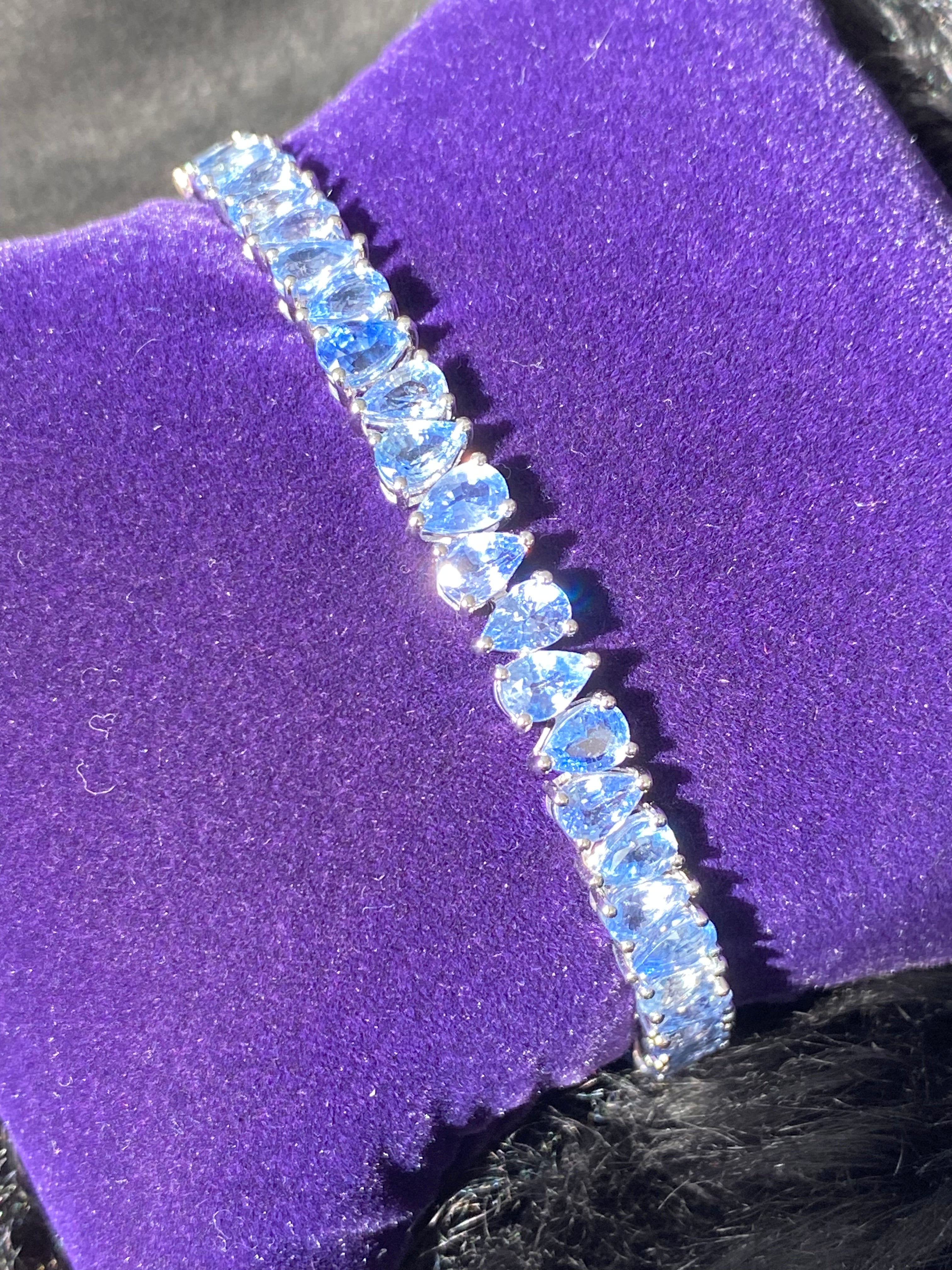 27.08 CTW Pear Cut Ceylon Sapphire Line Bracelet in 9ct White Gold