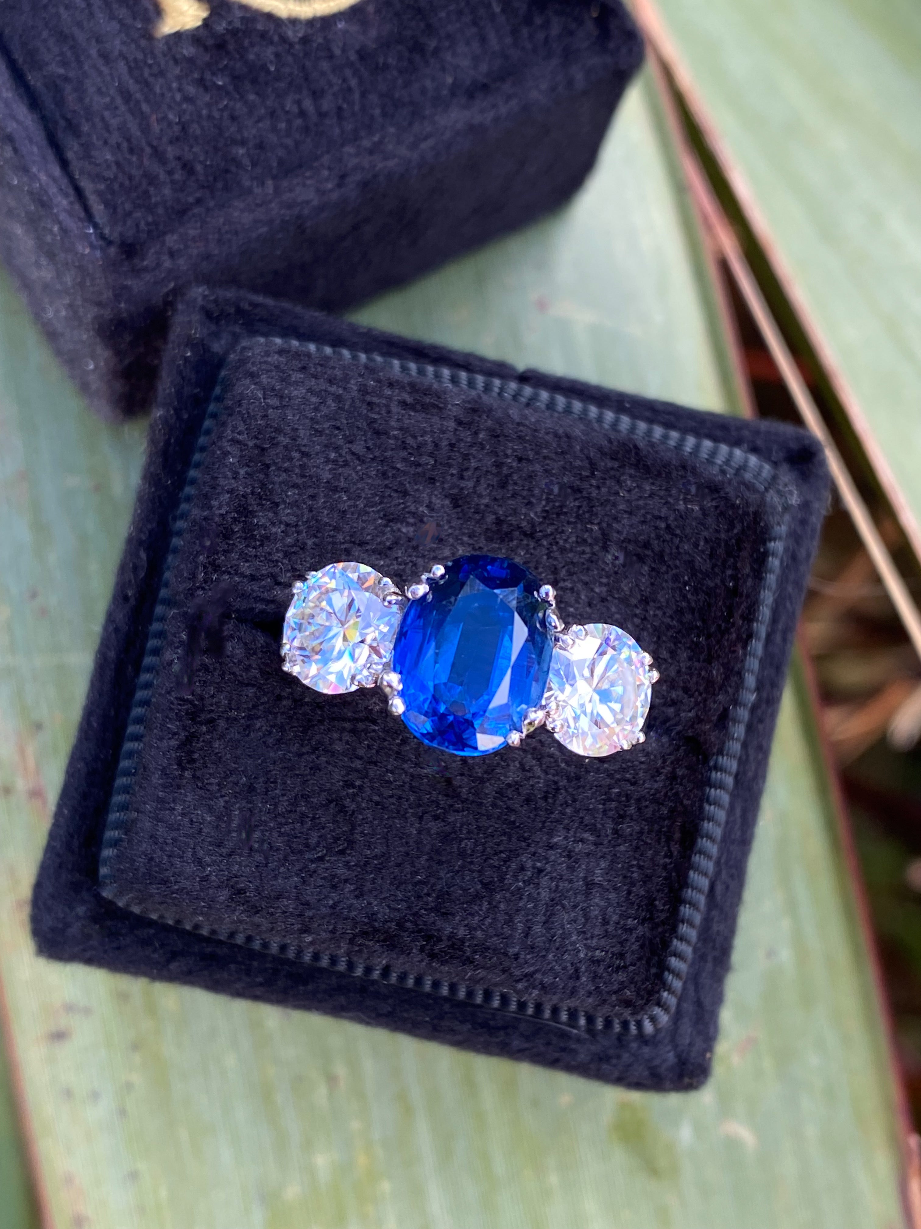 4.41 CTW Oval Cut Kyanite and Moissanite Three Stone Ring in Sterling Silver