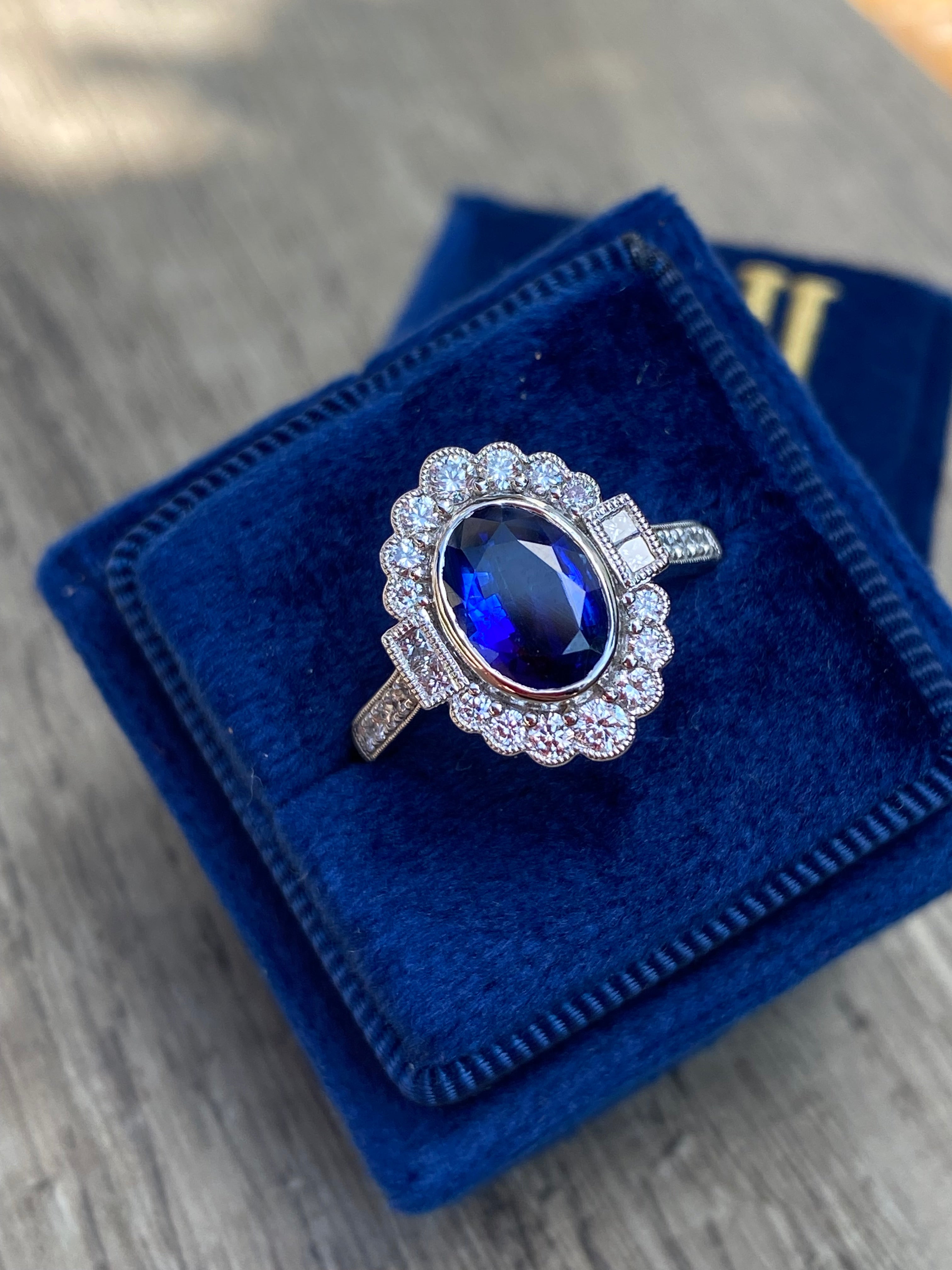 1.95 Carat Blue Ceylon Sapphire and Natural Diamond Halo Ring in Platinum