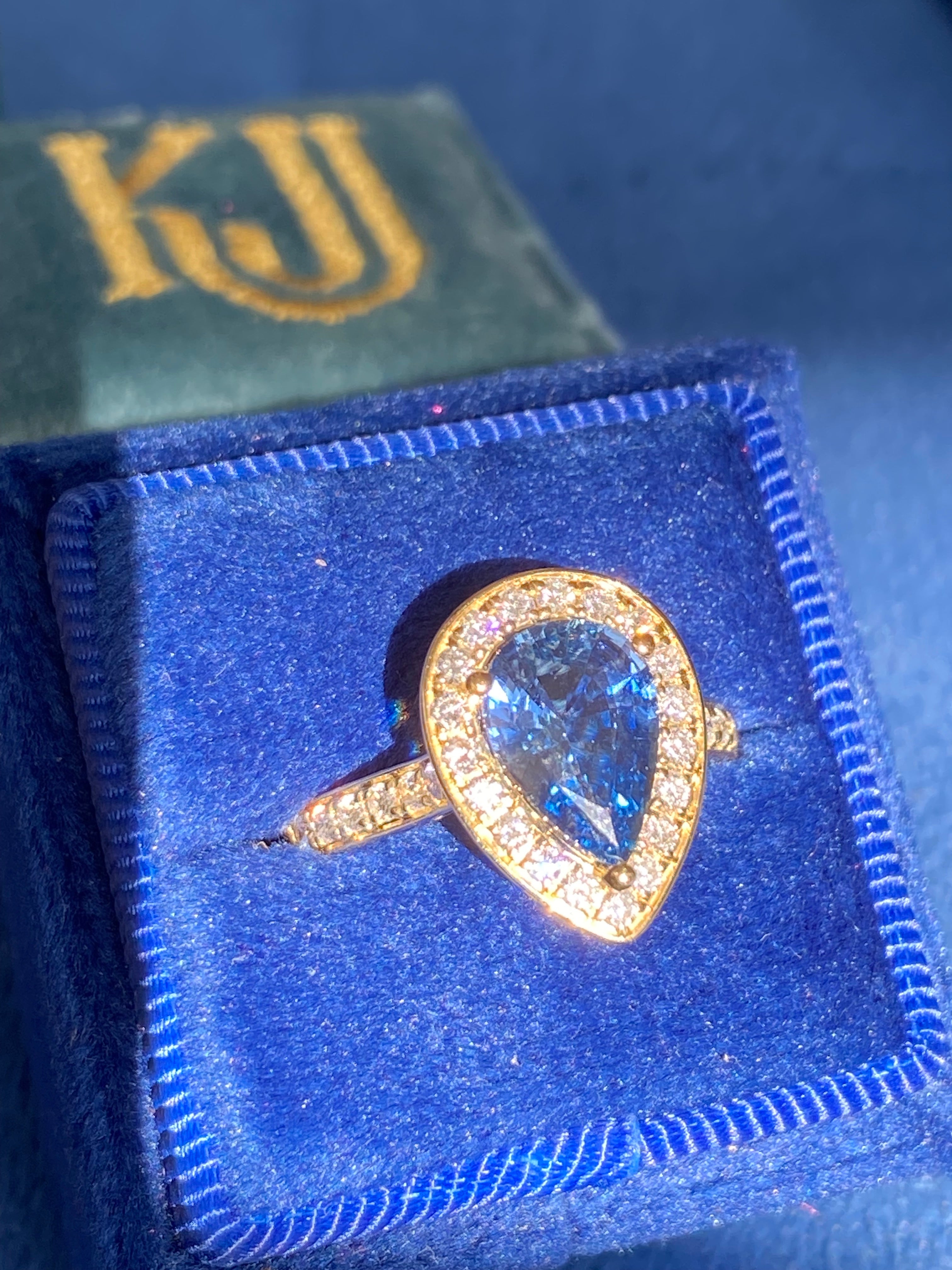 2.07 Carat Pear Cut Teal Sapphire and 0.48 CTW Natural Diamond Ring in 18ct Yellow Gold