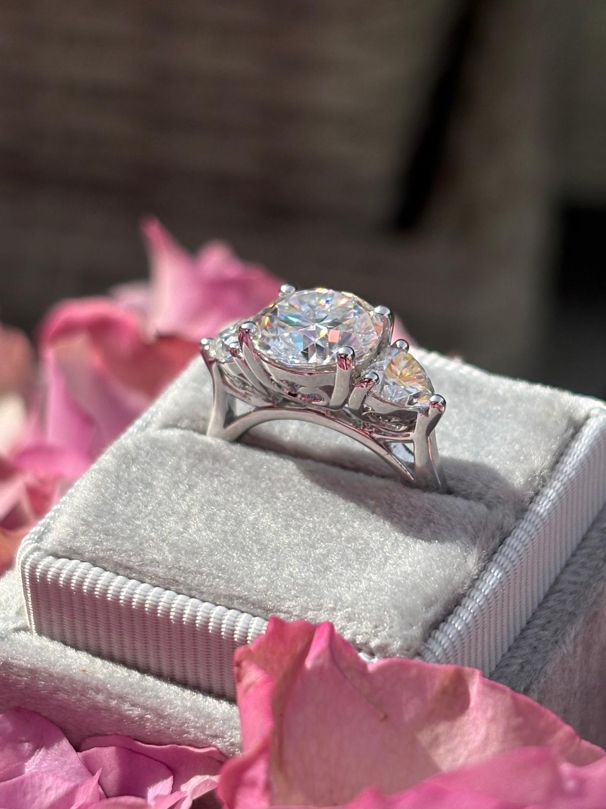3.40 CTW Round and Heart Shape Moissanite Three Stone Ring in Sterling Silver
