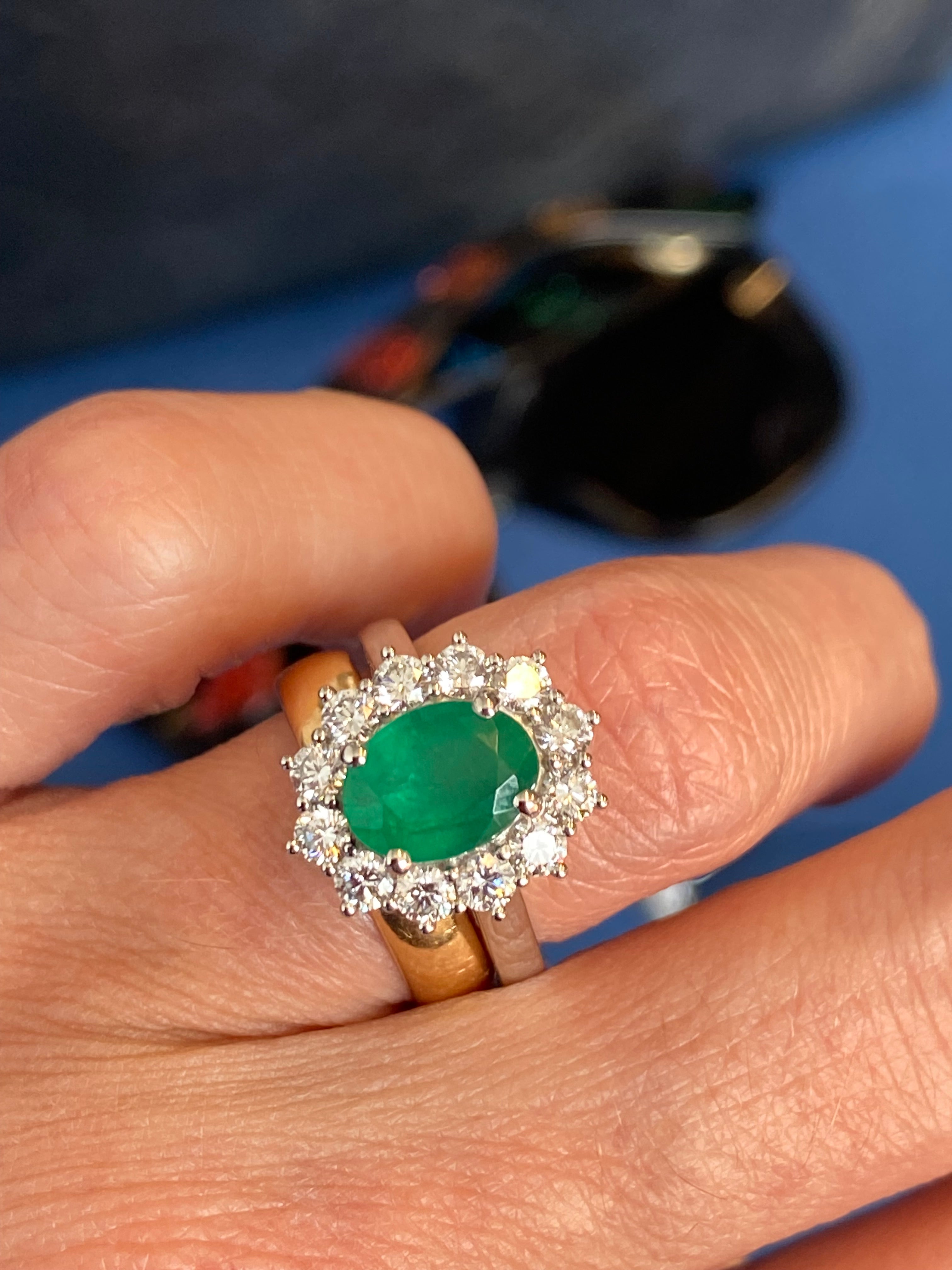 1.53 Carat Cushion Cut Emerald and 0.96 CTW Natural Diamond Halo Ring in Platinum