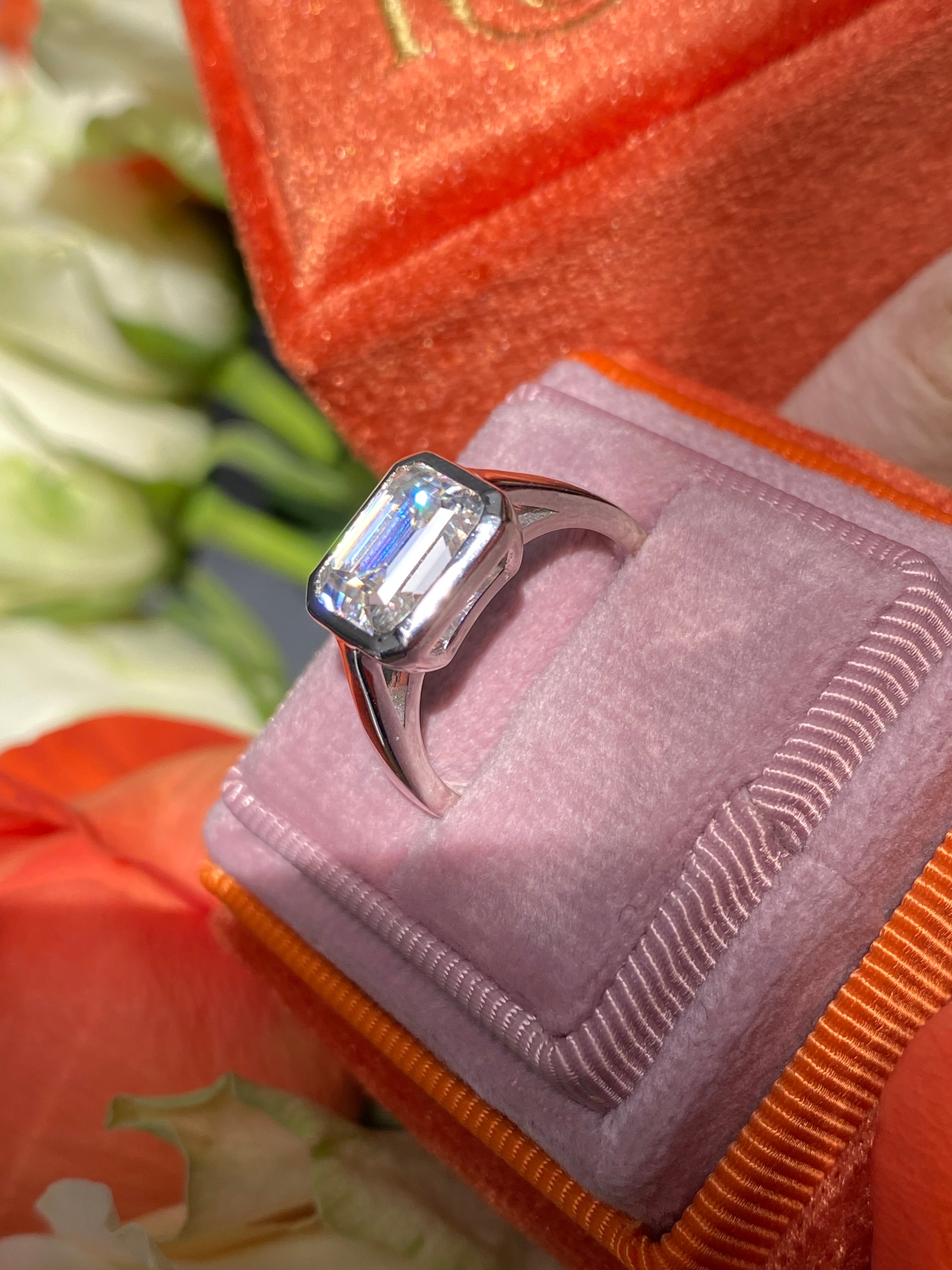 3.00 Carat Emerald Cut Moissanite East West Solitaire Ring in Sterling Silver