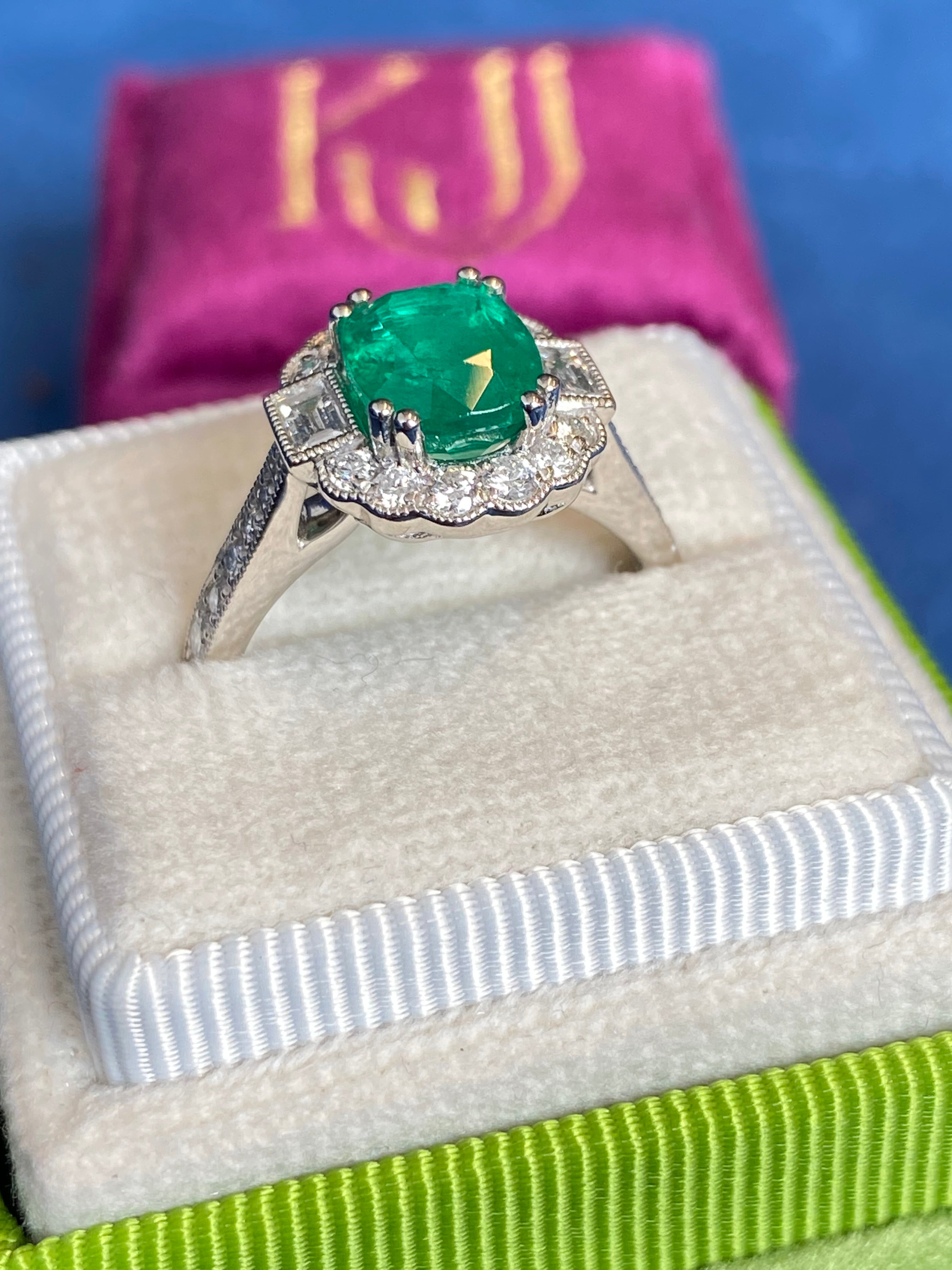 2.02 Carat Cushion Cut Emerald and 0.65 CTW Natural Diamond Halo Ring in Platinum