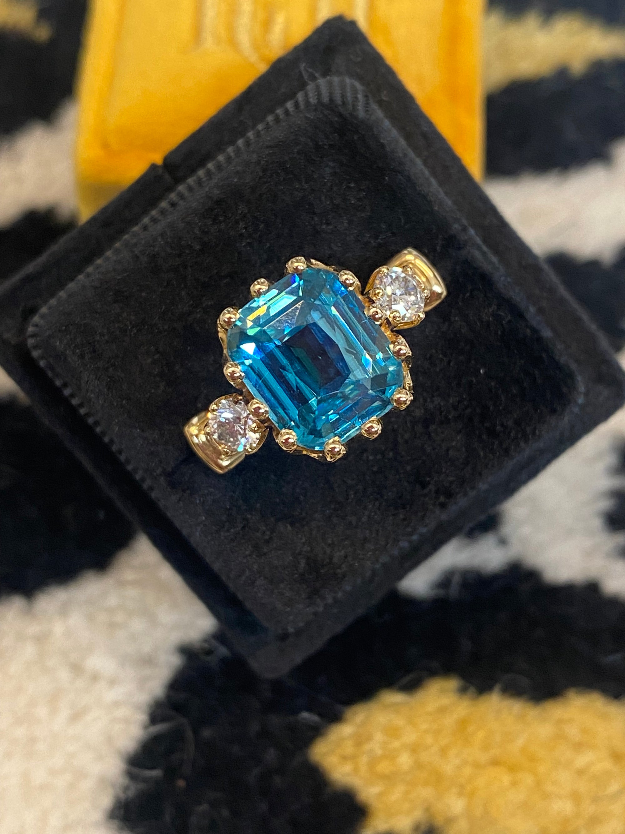 6.75 Carat Blue Zircon and Diamond Three Stone Ring in 18ct Yellow Gold