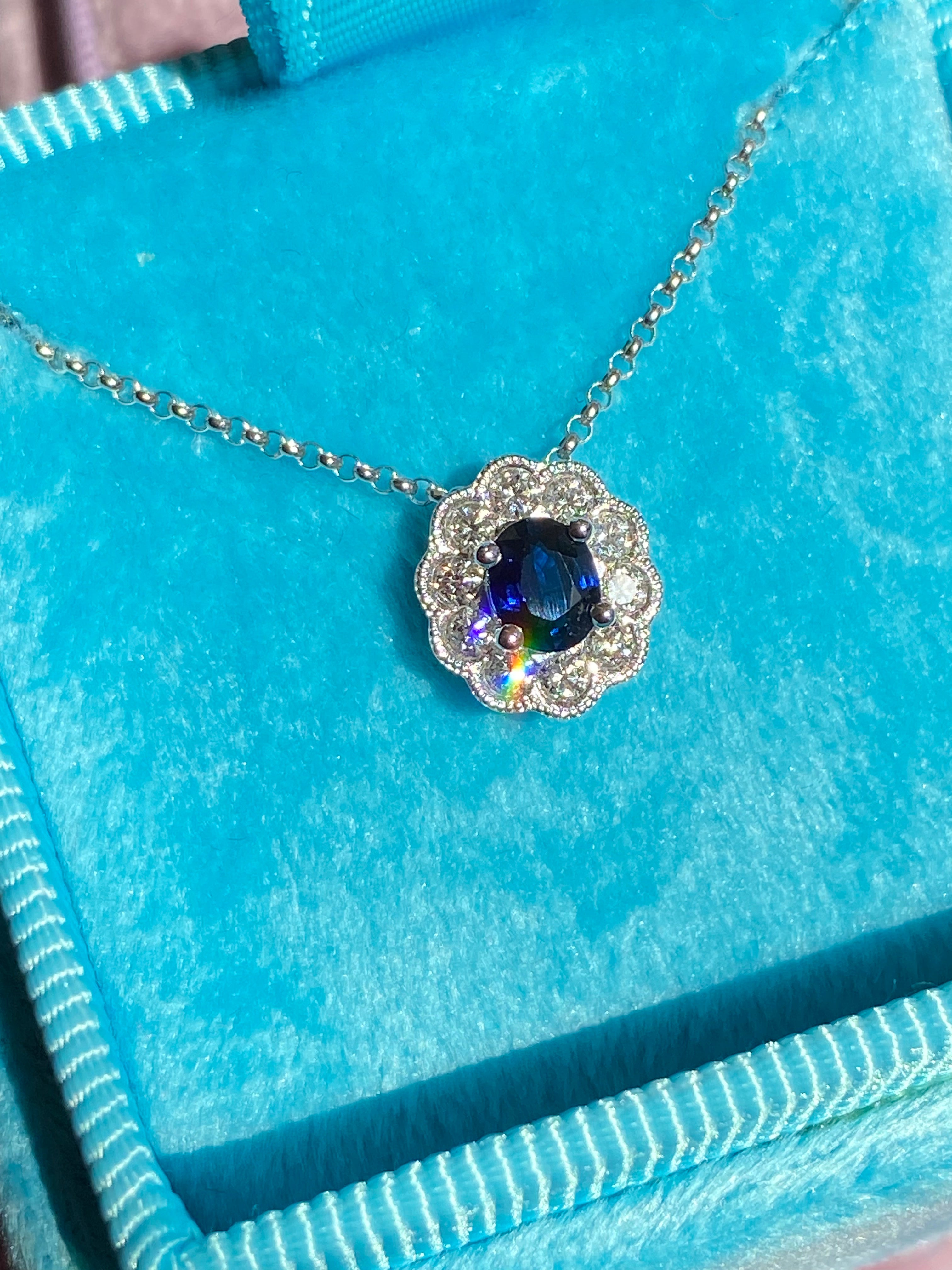 0.73 CTW Sapphire and Natural Diamond Pendant Necklace in 18ct White Gold