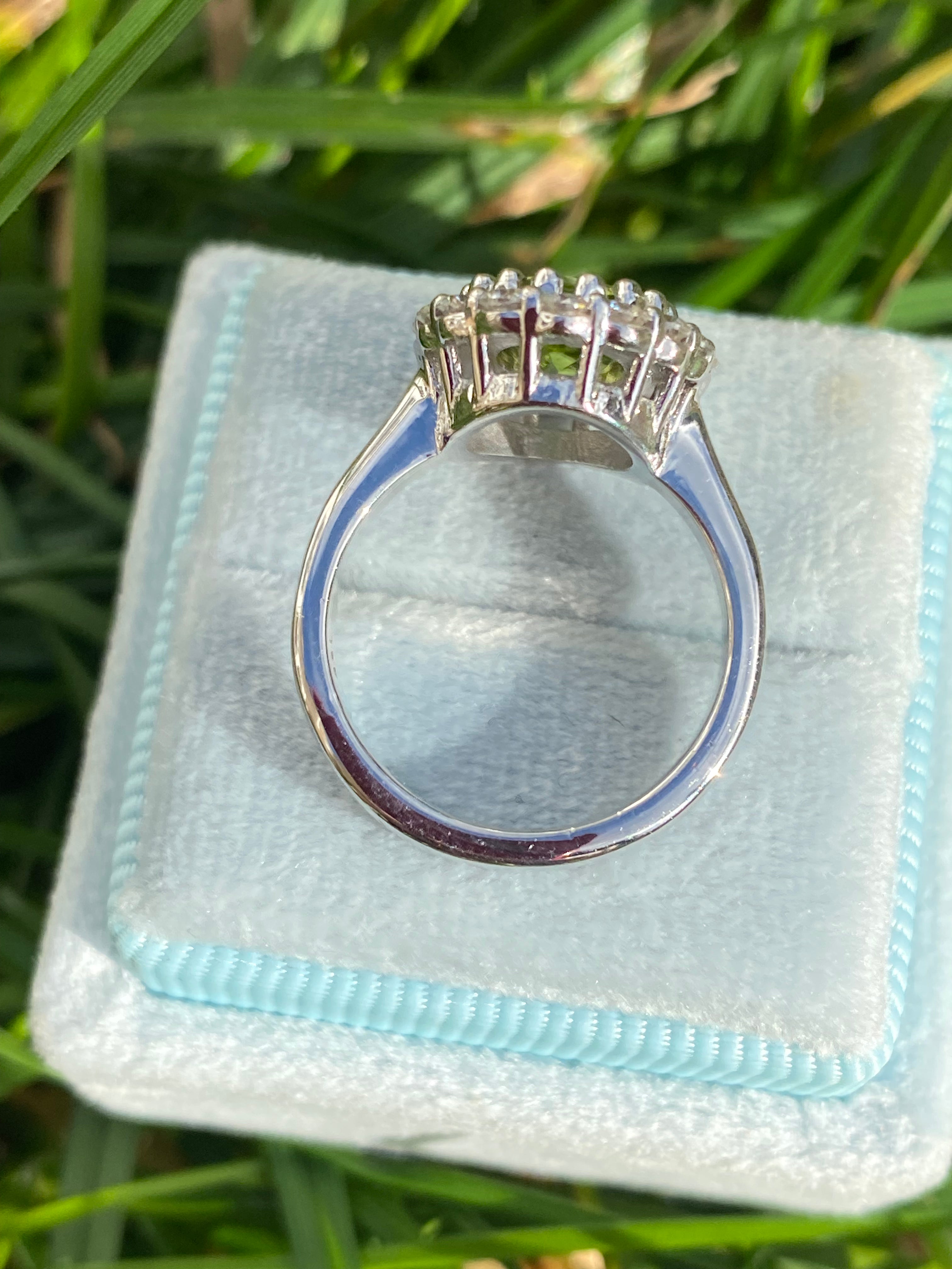 2.33 CTW Oval Cut Peridot and Moissanite Halo Cocktail Ring in Sterling Silver