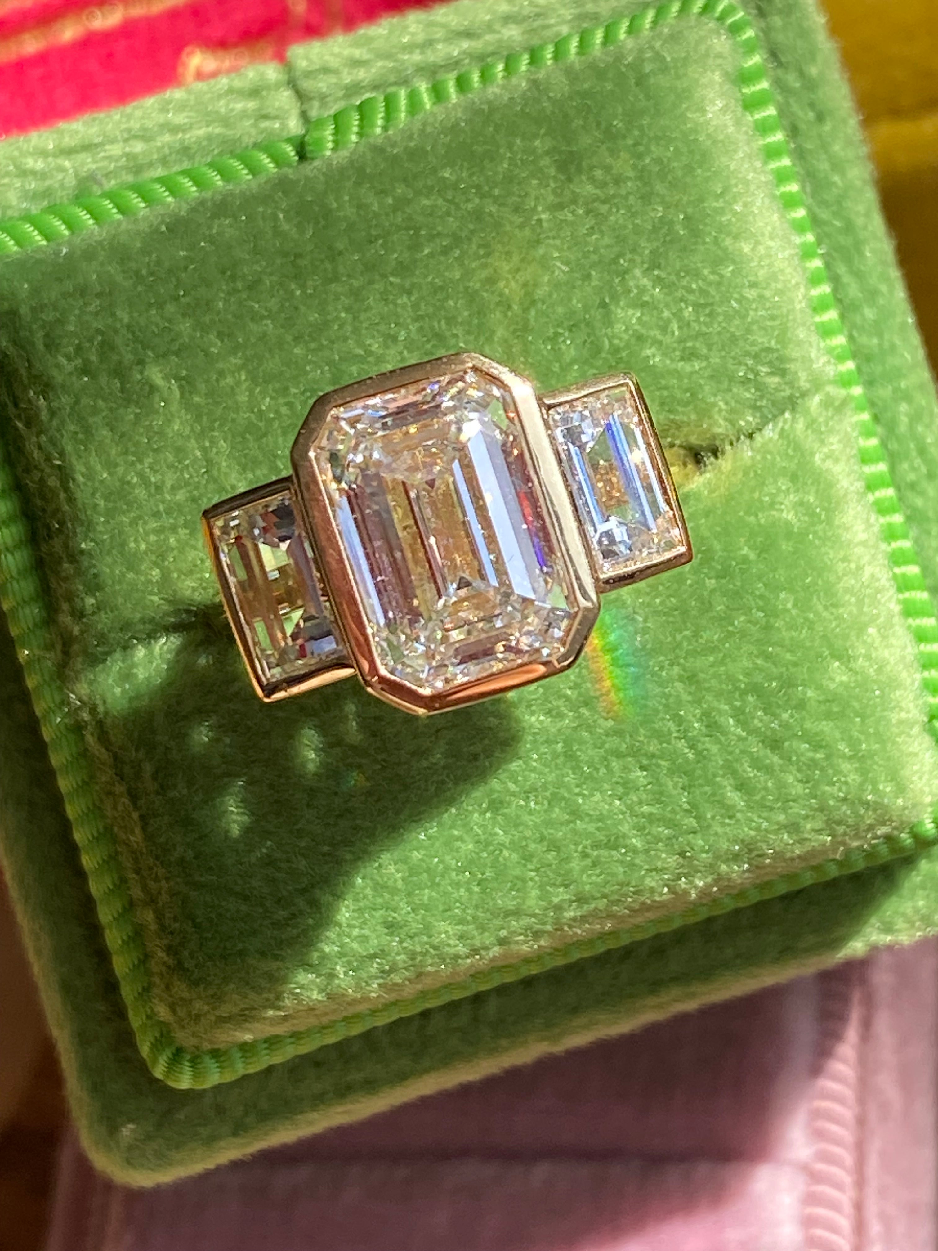 4.32 CTW Emerald Cut Bezel Set Lab Diamond Ring in 18ct Yellow Gold