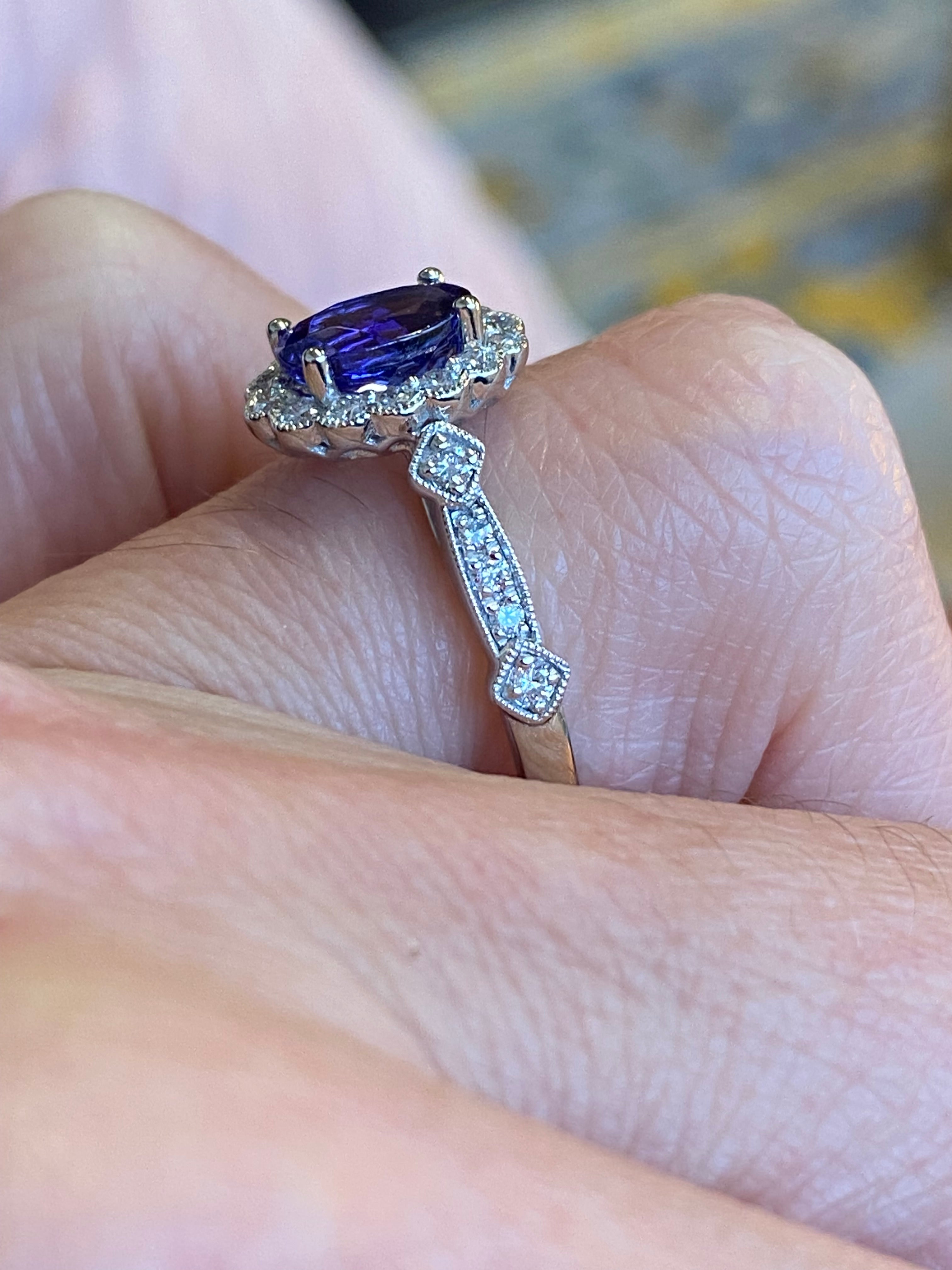 1.44 CTW Tanzanite and Natural Diamond Halo Ring in Platinum