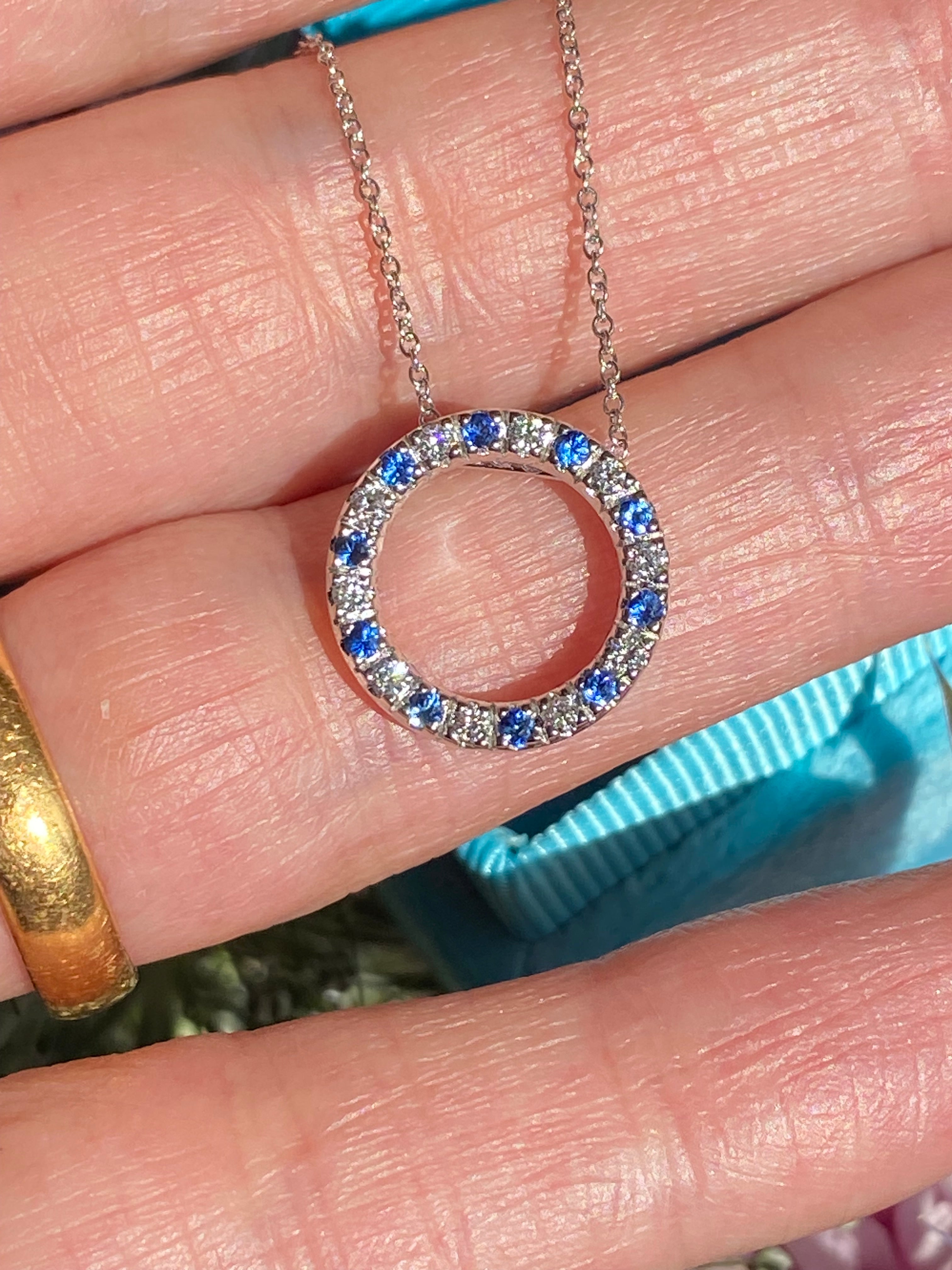 0.35 CTW Sapphire and Diamond Circle Necklace in 18ct White Gold