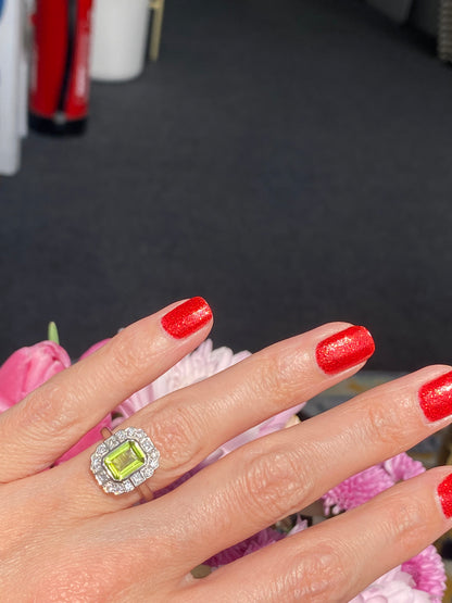 1.32 Carat Peridot and Natural Diamond Ring in Platinum