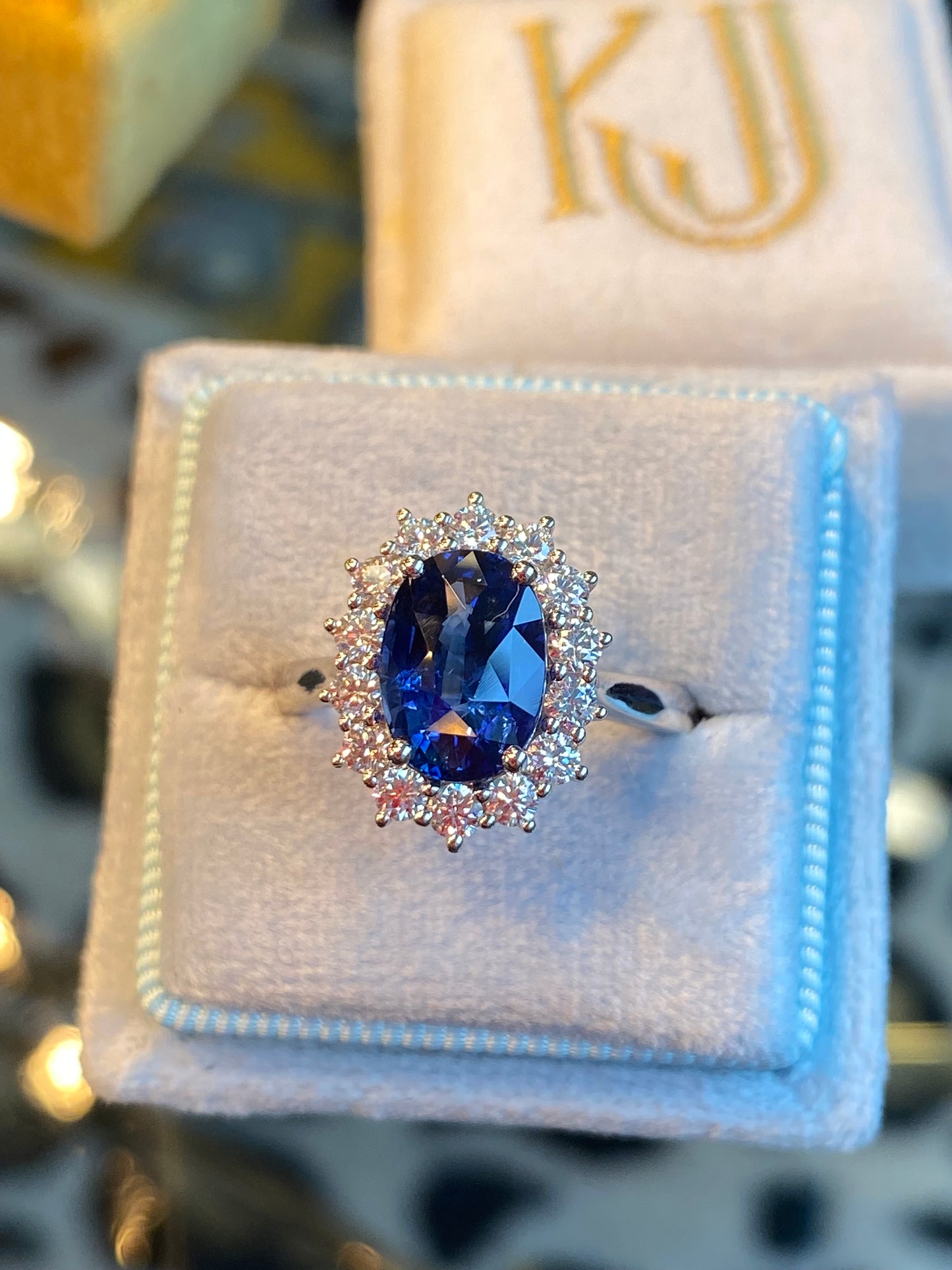 3.04 Carat Blue Ceylon Sapphire and 0.63 CTW Natural Diamond Halo Ring in Platinum
