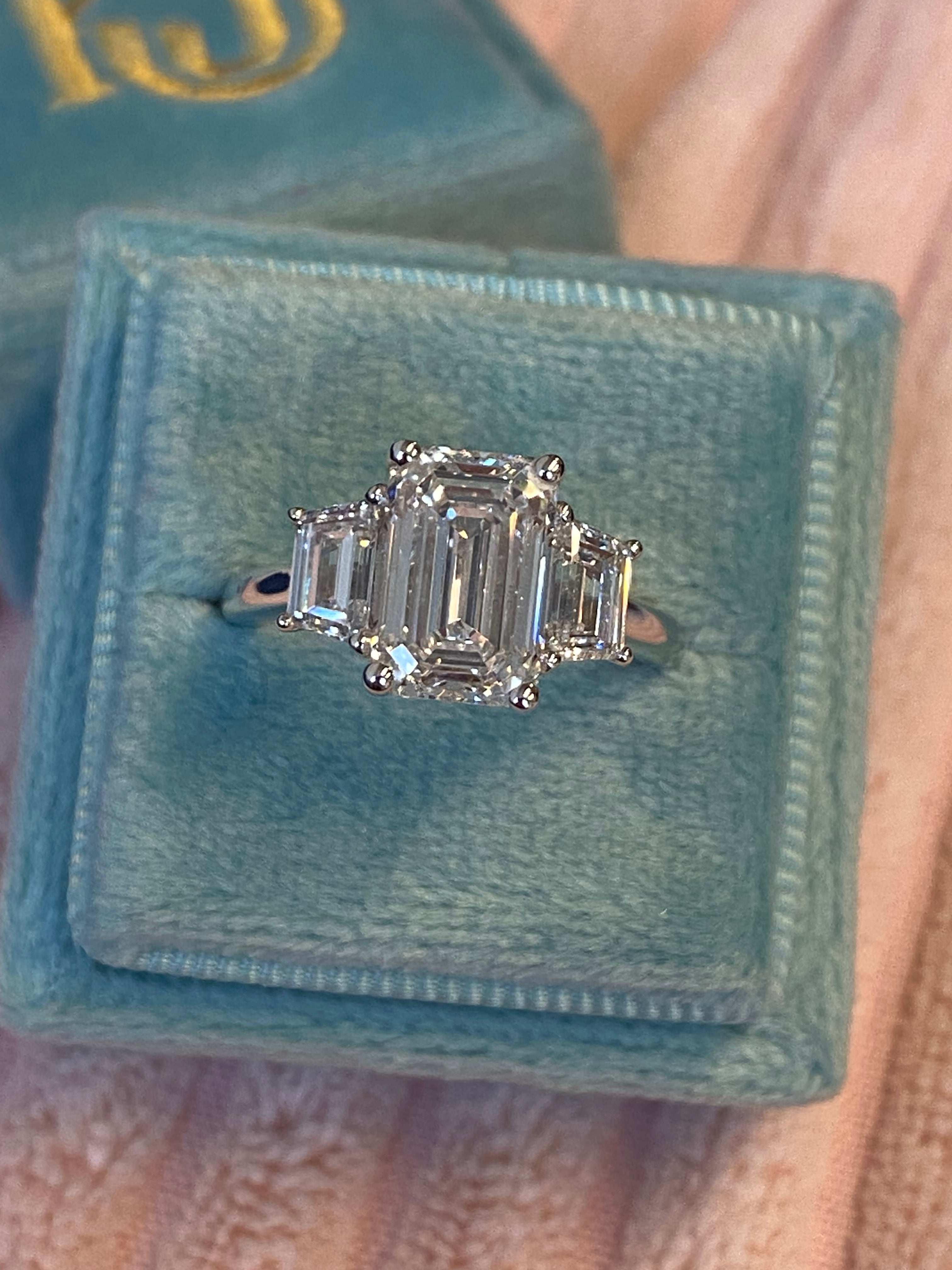 3.93 CTW Emerald and Trapezoid Cut D Colour VS1 Lab Diamond Three Stone Ring in Platinum