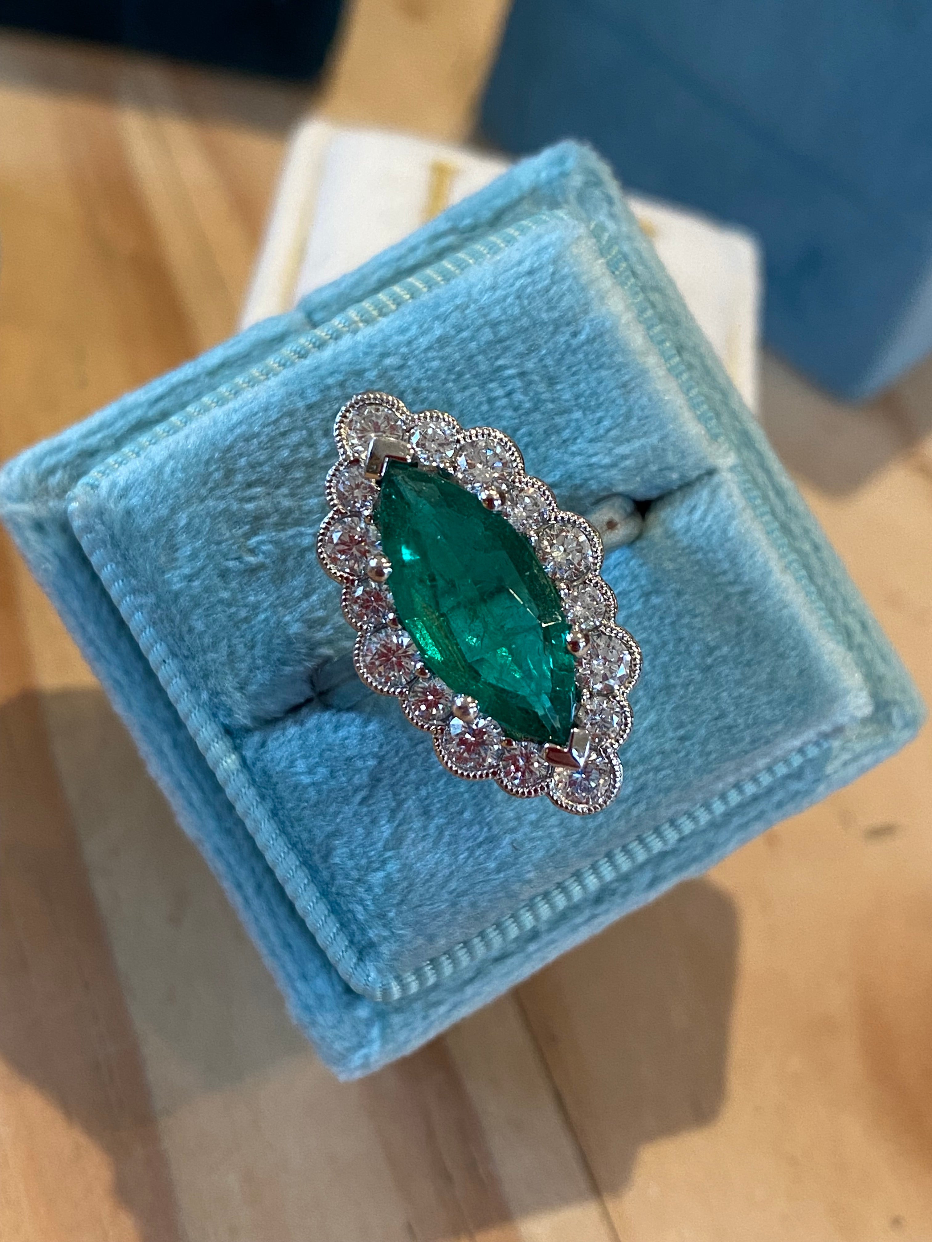 3.47 CTW Marquise Cut Emerald and Natural Diamond Halo Ring in Platinum
