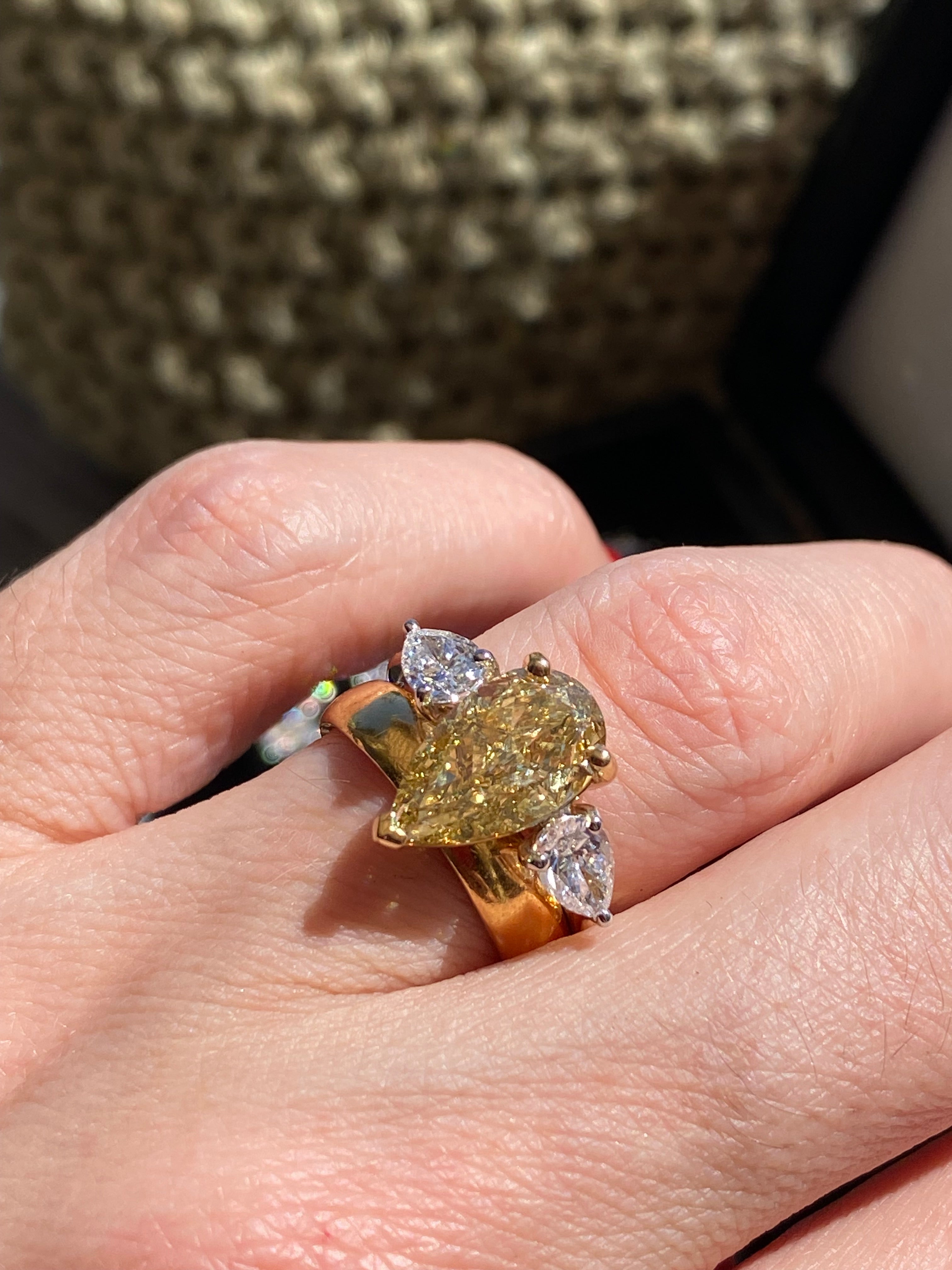 4.04 CTW Pear Cut Fancy Yellow Lab Diamond Three Stone Engagement Ring in 18ct Yellow and White Gold