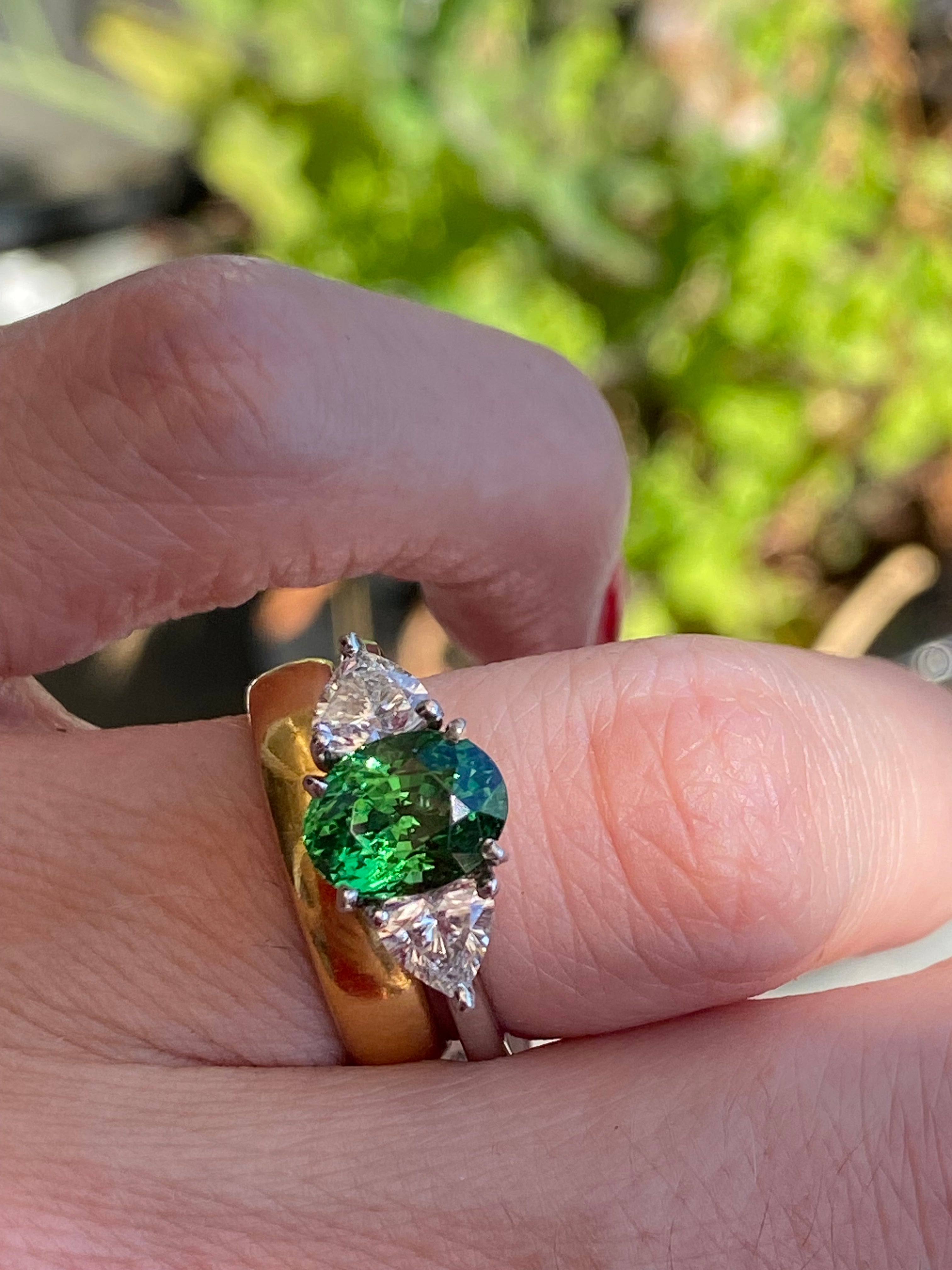 2.49 Carat Tsavorite Garnet and 0.83 Carat Diamond Three Stone Engagement Ring in Platinum