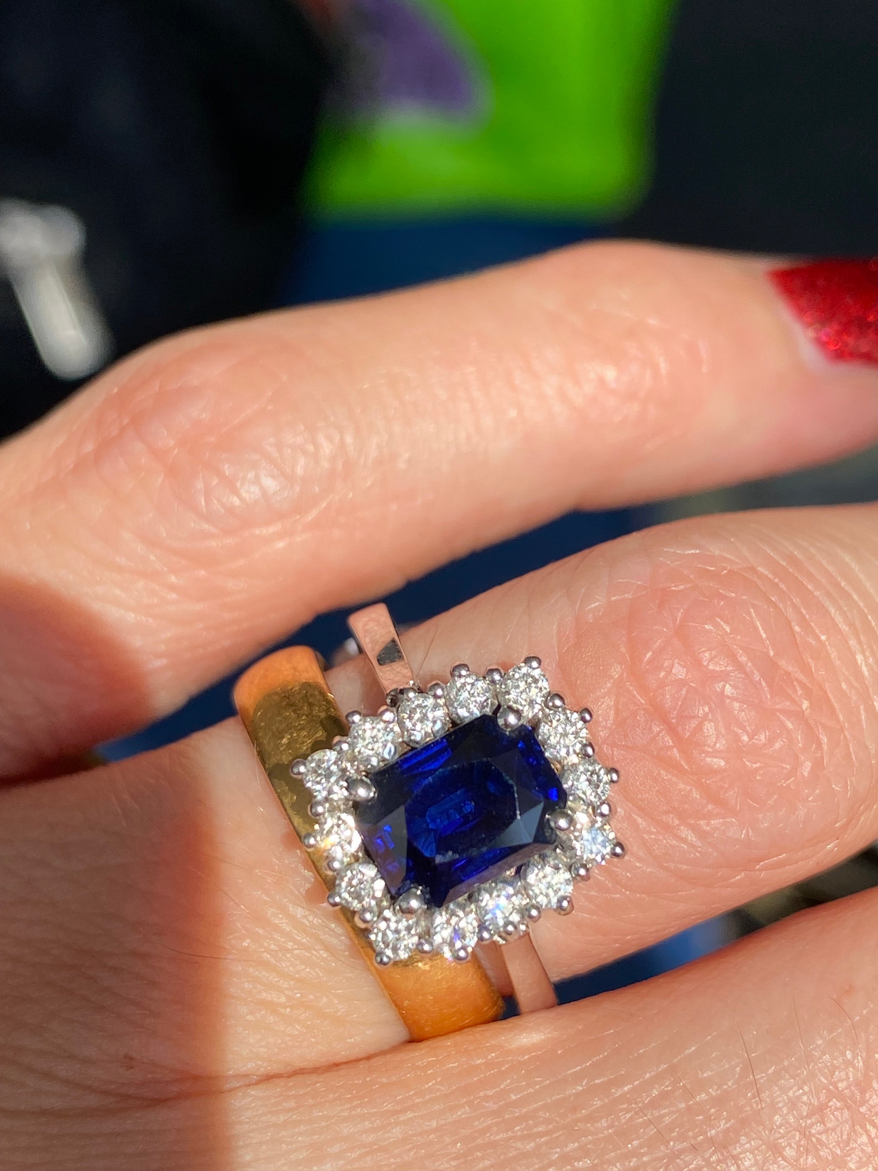 Vintage 2.05 Carat Sapphire and Natural Diamond Halo Ring in Platinum