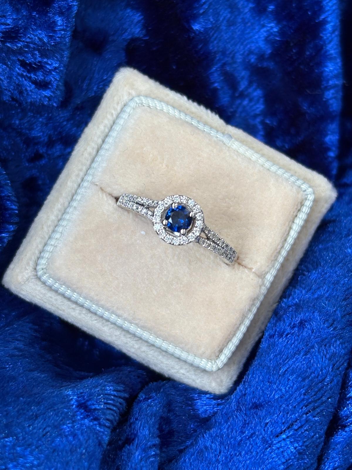 Beautiful Sapphire and Natural Diamond Halo Ring in 18ct White Gold