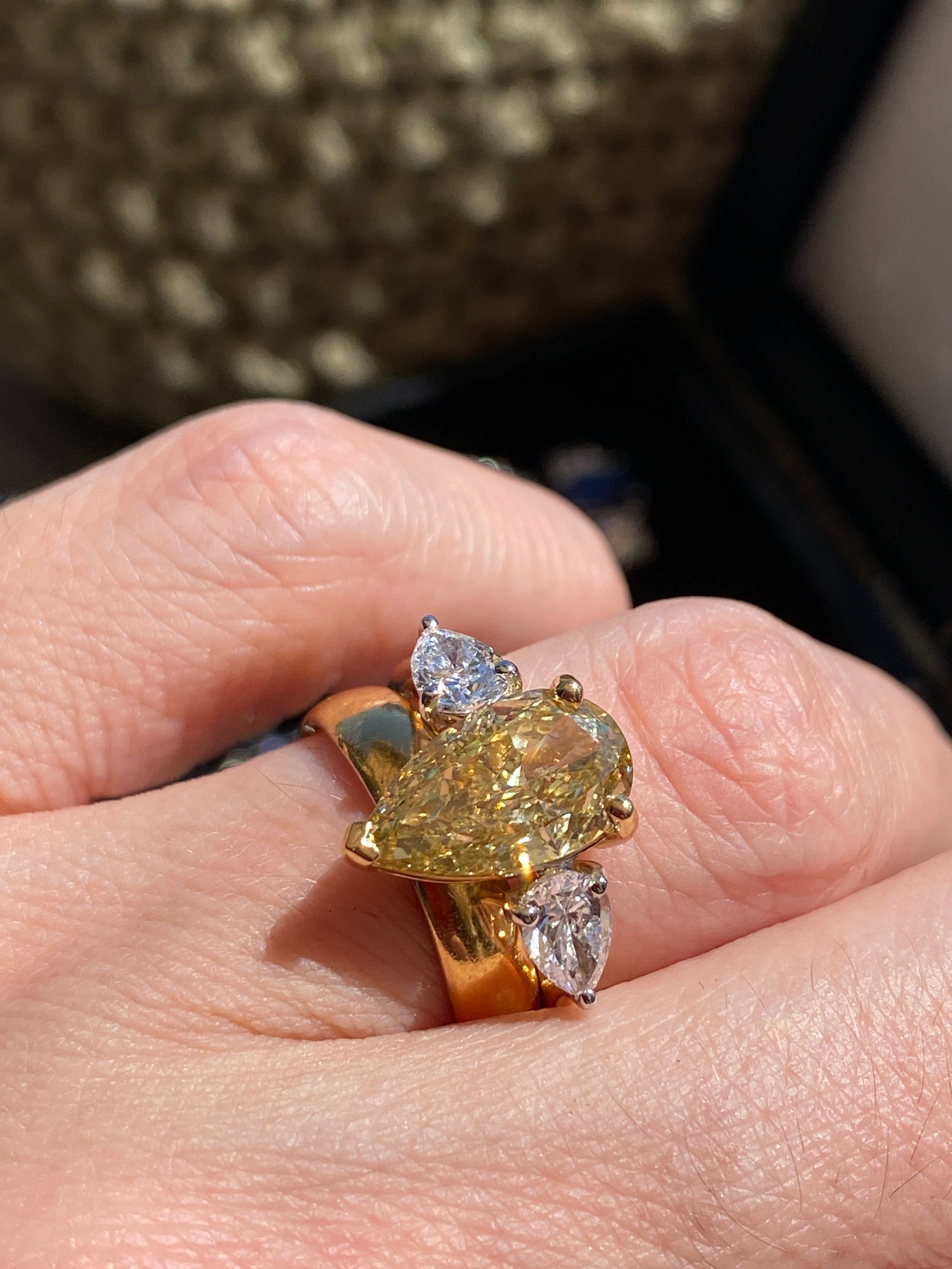 4.04 CTW Pear Cut Fancy Yellow Lab Diamond Three Stone Engagement Ring in 18ct Yellow and White Gold