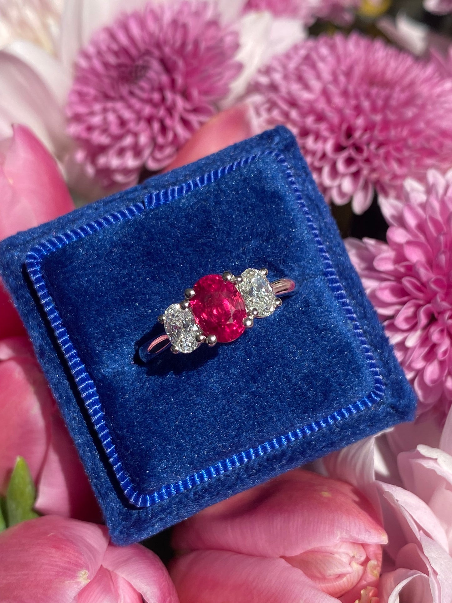 1.34 Carat Ruby and 0.66 Natural Diamond Three Stone Ring in Platinum