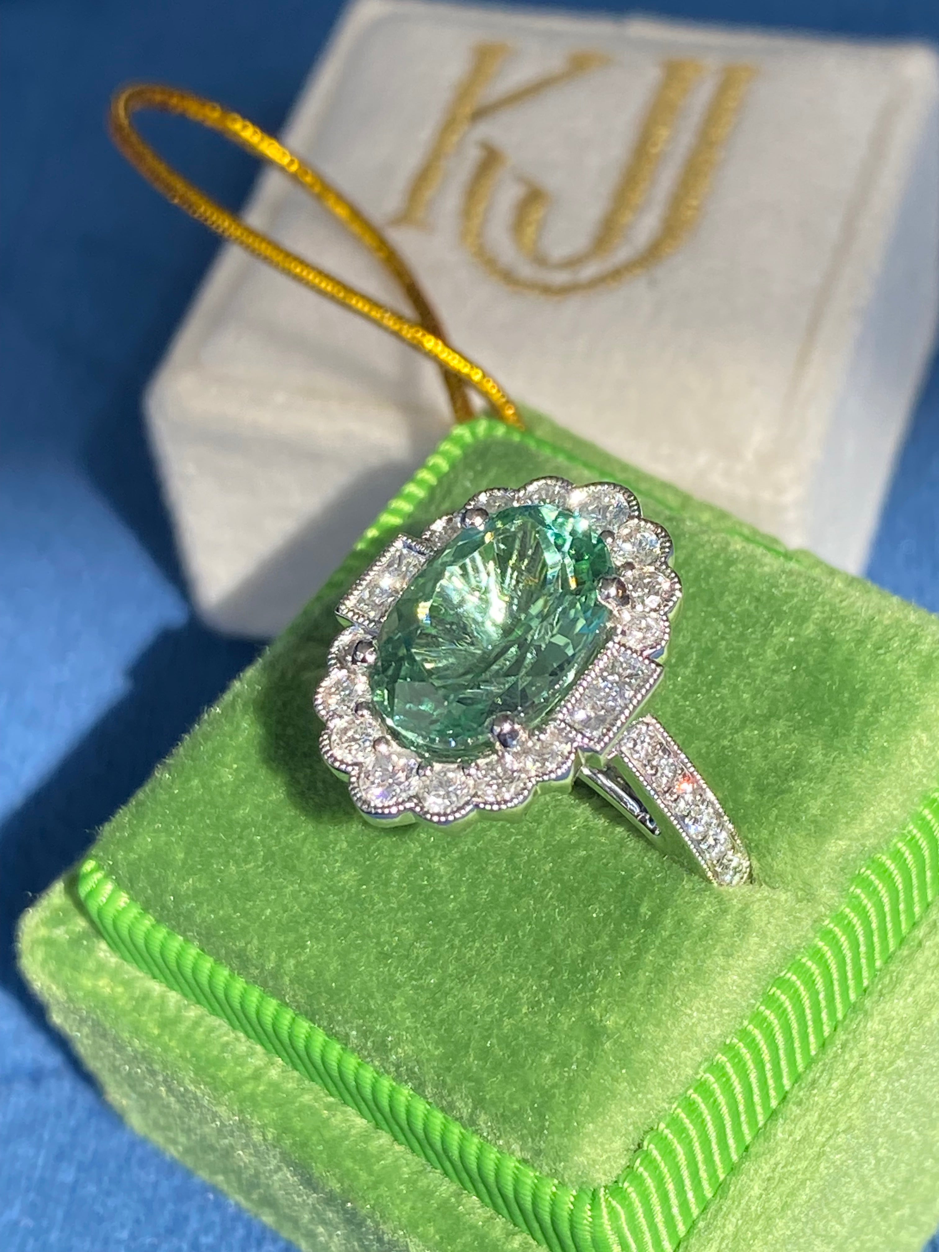 4.07 Carat Oval Cut Mint Tourmaline and 0.80 CTW Natural Diamond Ring in Platinum