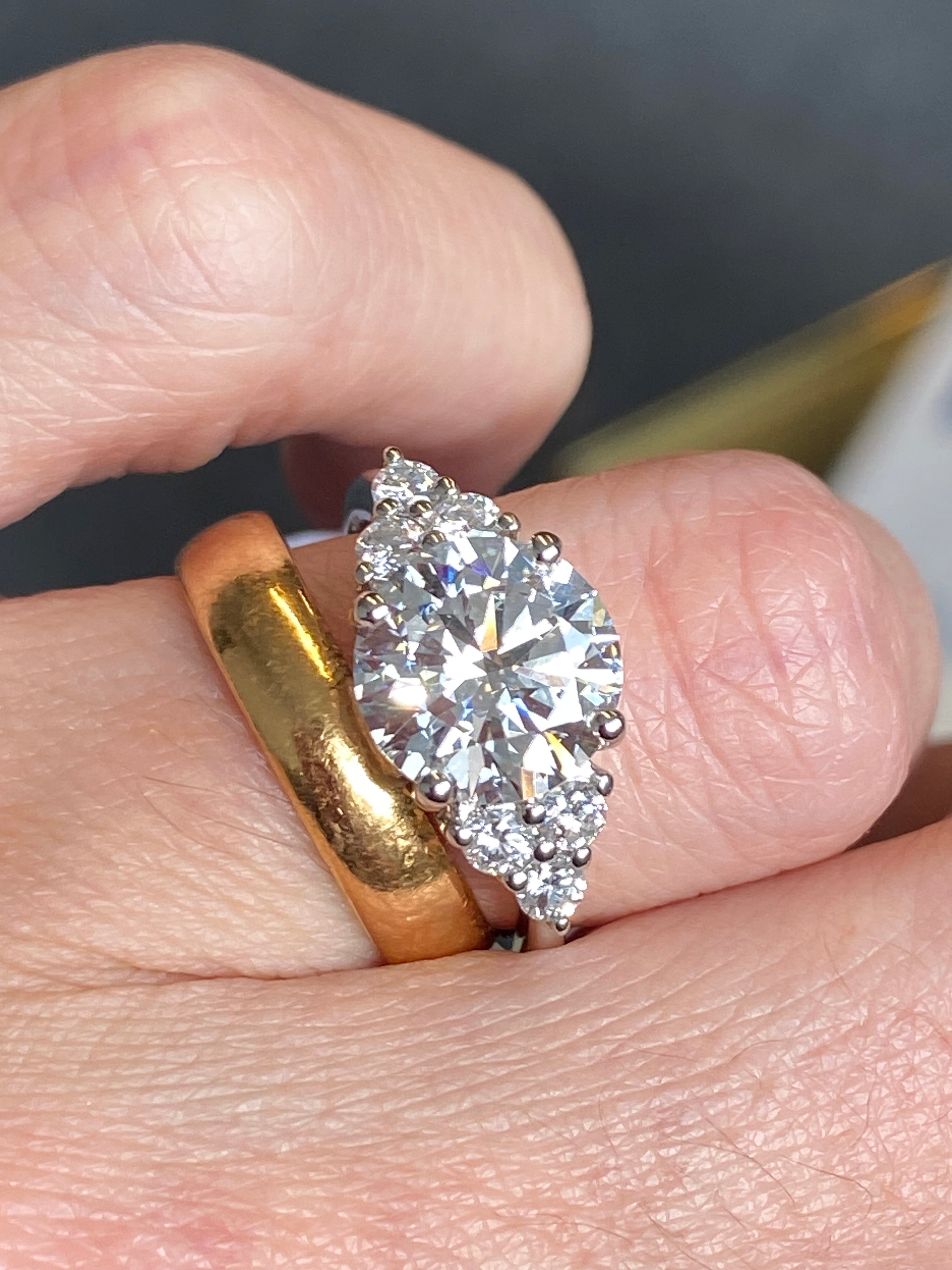 3.39 Carat Round Brilliant Cut D Colour VS1 Lab Diamond Trefoil Three Stone Ring in Platinum