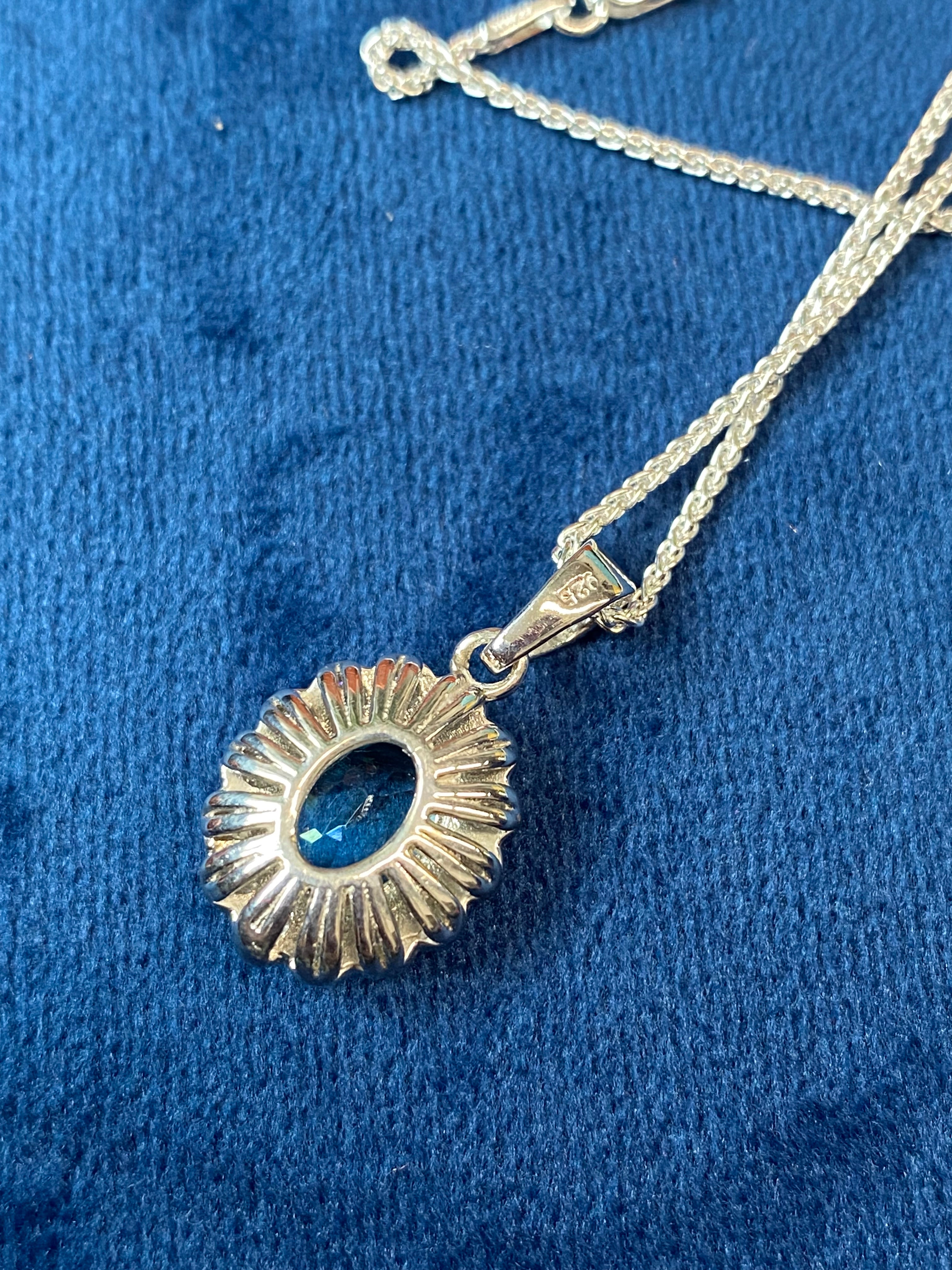 5.00 CTW Blue Topaz and Moissanite Halo Pendant Necklace in Sterling Silver
