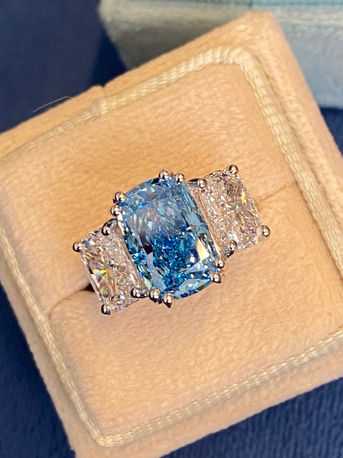 6.60 CTW Fancy Blue Cushion Cut Lab Diamond Graduated Three Stone Ring in Platinum