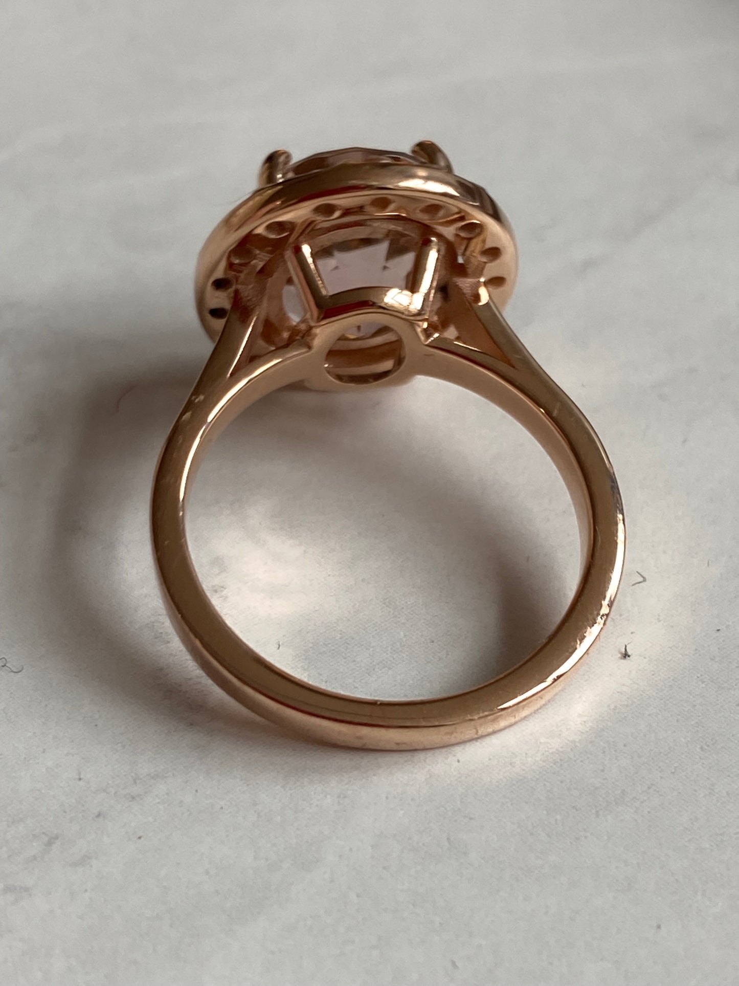 6.00 Carat Oval-Cut Pink Tourmaline and Diamond Halo Ring in 18ct Rose Gold