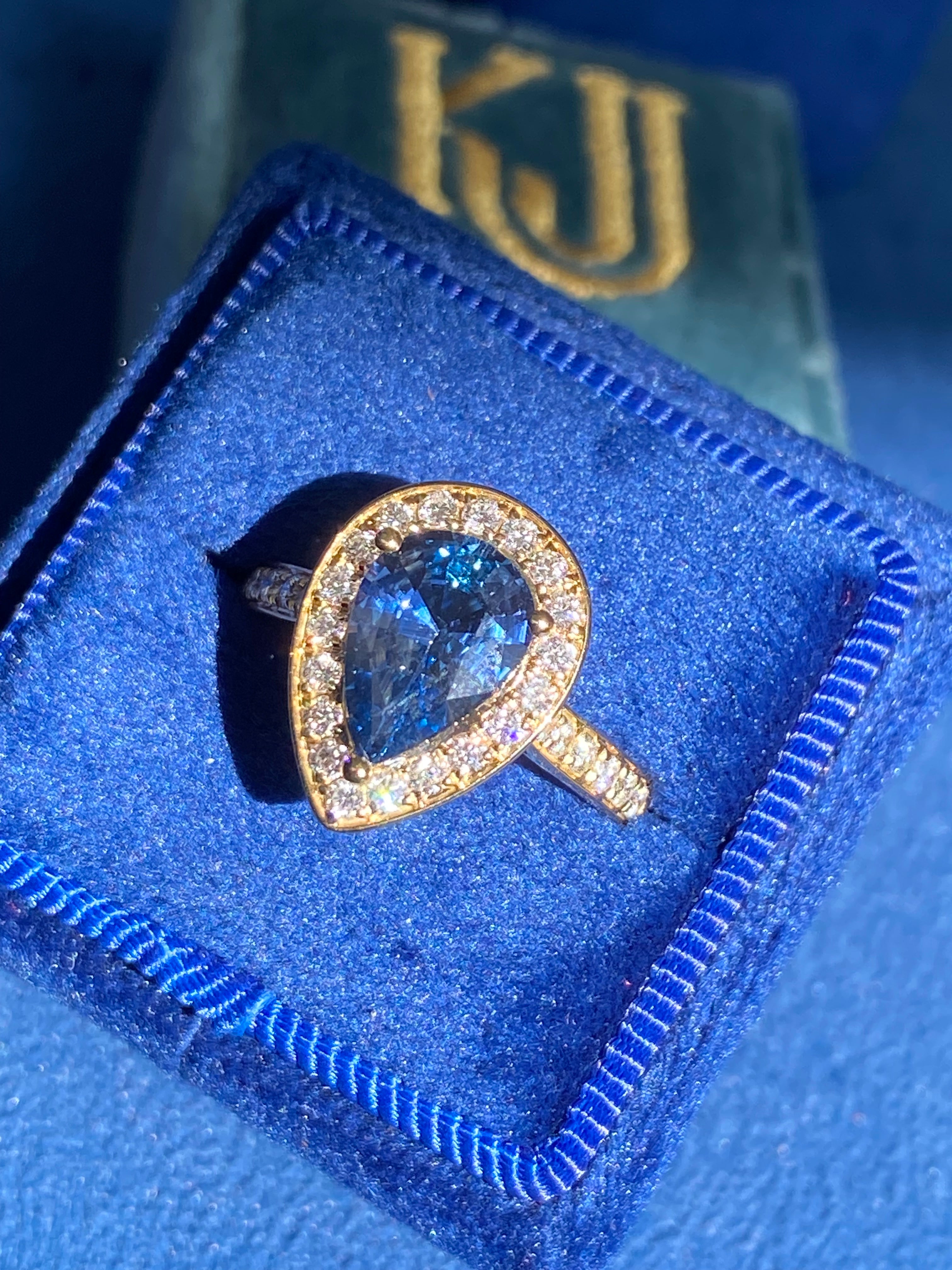 2.07 Carat Pear Cut Teal Sapphire and 0.48 CTW Natural Diamond Ring in 18ct Yellow Gold
