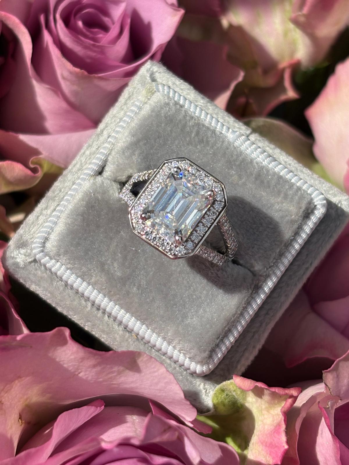 3.10 CTW Emerald Cut Moissanite Halo Ring in Sterling Silver