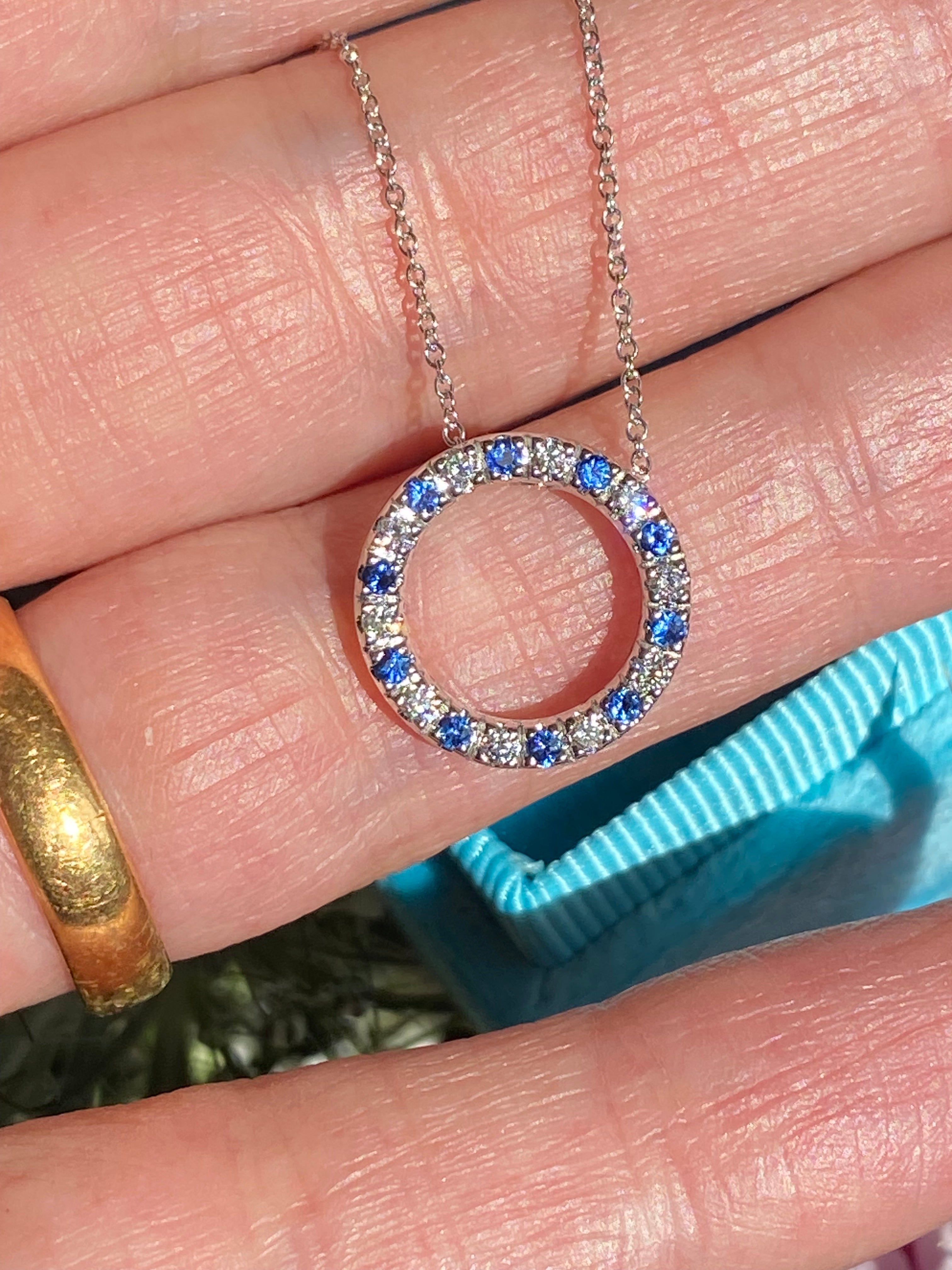 0.35 CTW Sapphire and Diamond Circle Necklace in 18ct White Gold